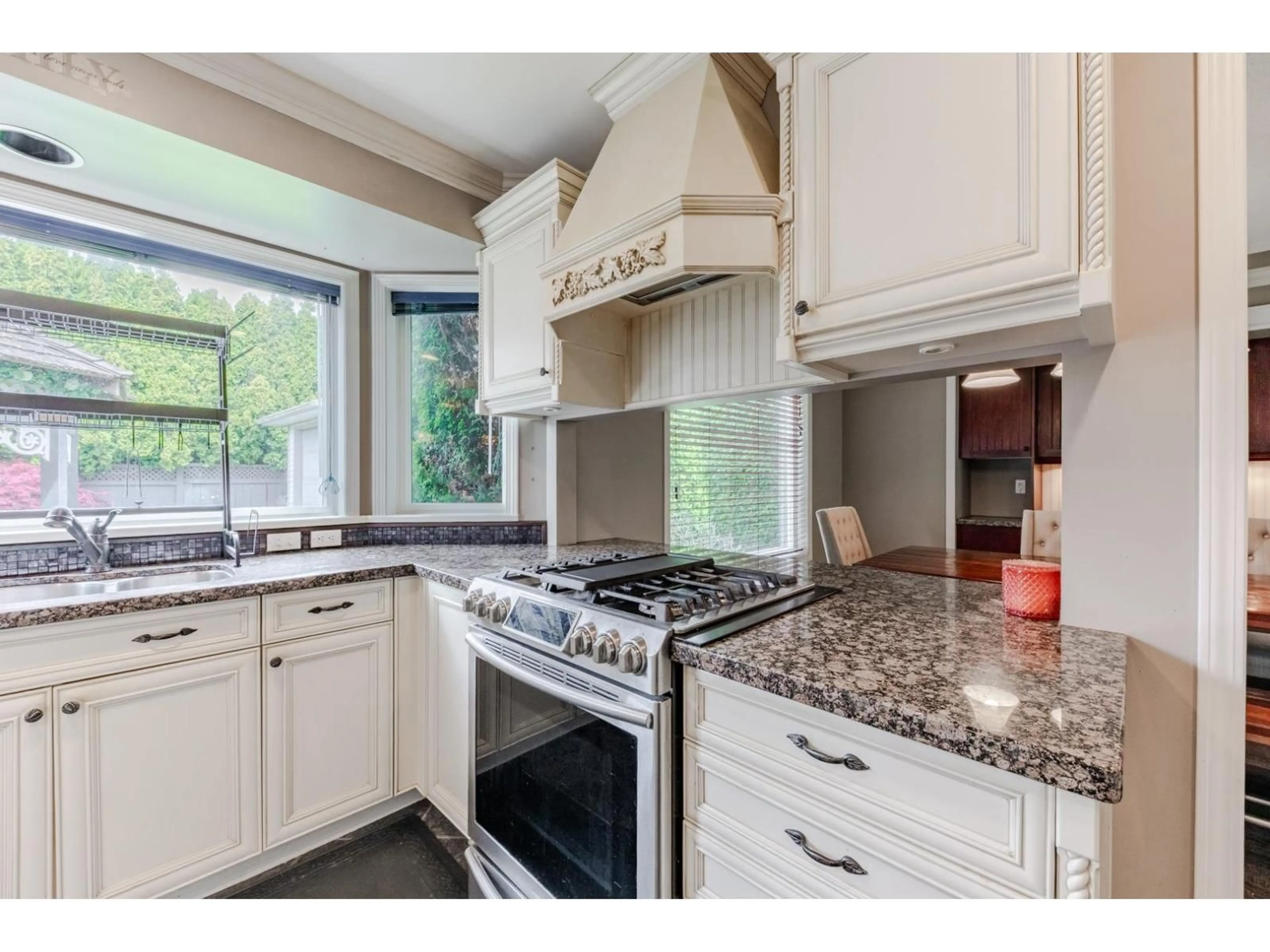 Open concept kitchen, ceramic/tile floor for 12931 18 AVENUE, Surrey British Columbia V4A7P7