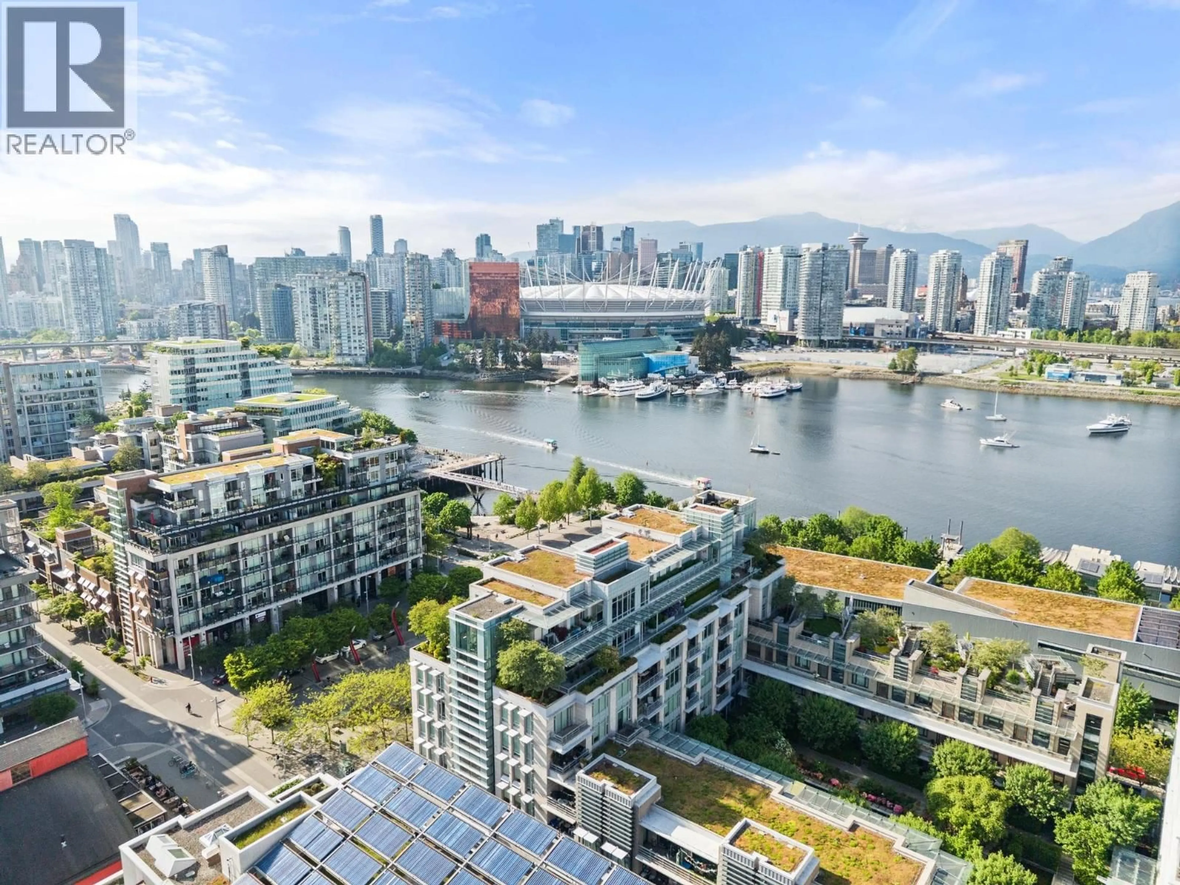 A pic from outside/outdoor area/front of a property/back of a property/a pic from drone, city buildings view from balcony for 801 - 77 WALTER HARDWICK AVENUE, Vancouver British Columbia V5Y0C6