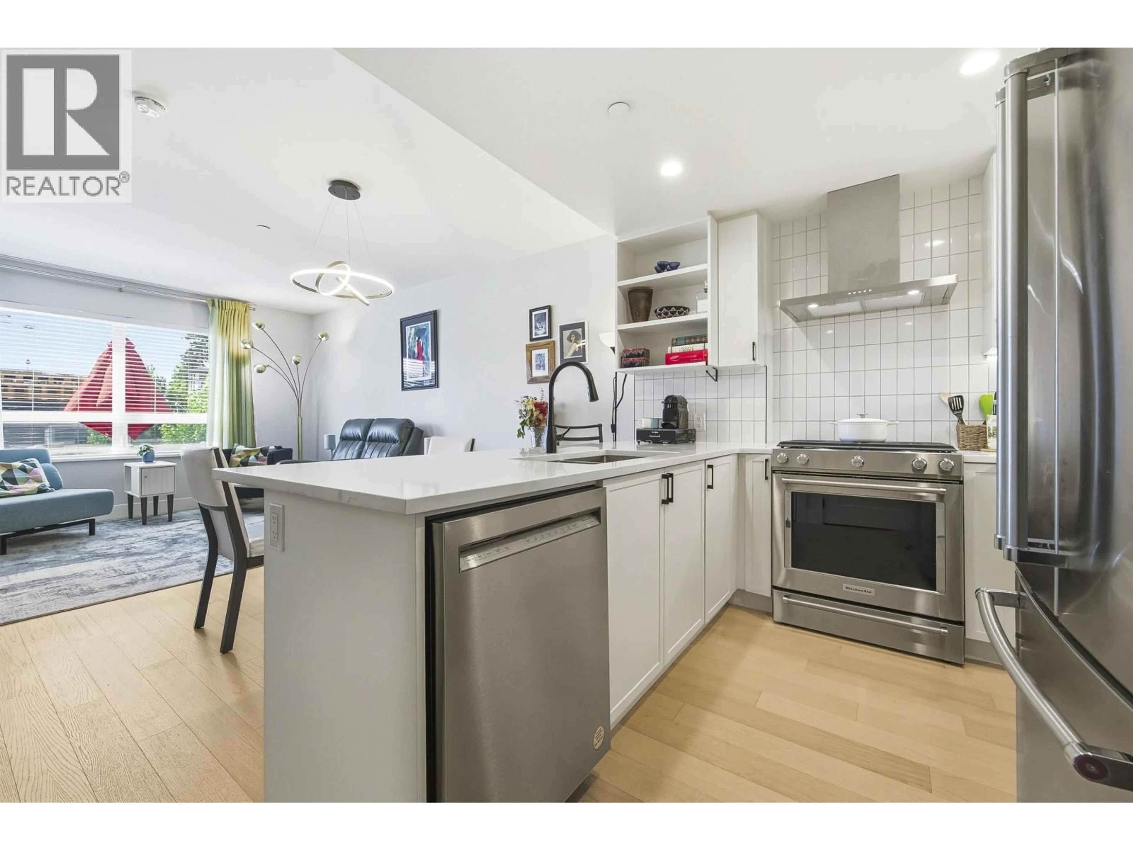 Open concept kitchen, unknown for 204 - 22265 DEWDNEY TRUNK ROAD, Maple Ridge British Columbia V2X3J1