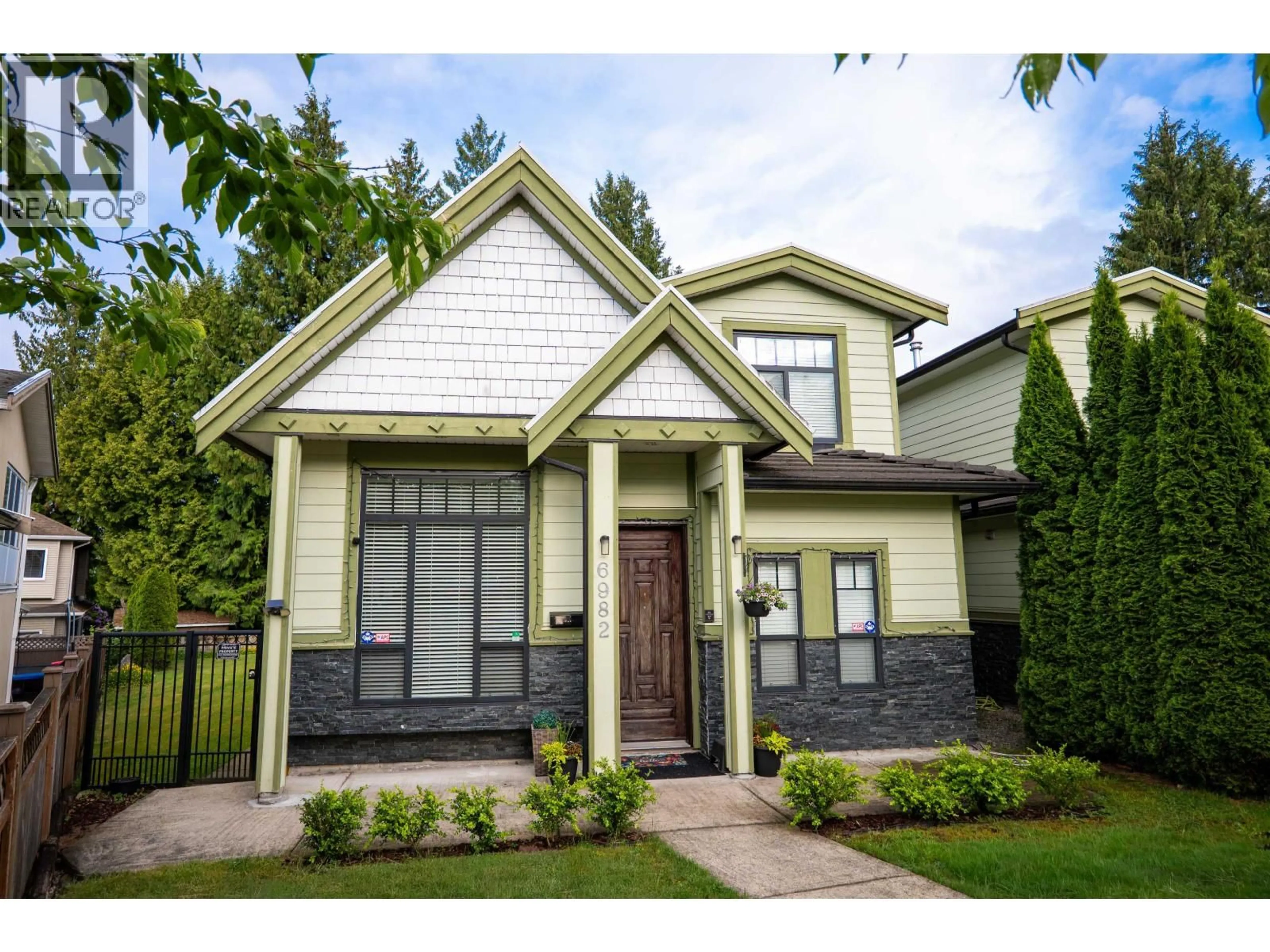 Home with brick exterior material, street for 6982 BURNS COURT, Burnaby British Columbia V5E1T6