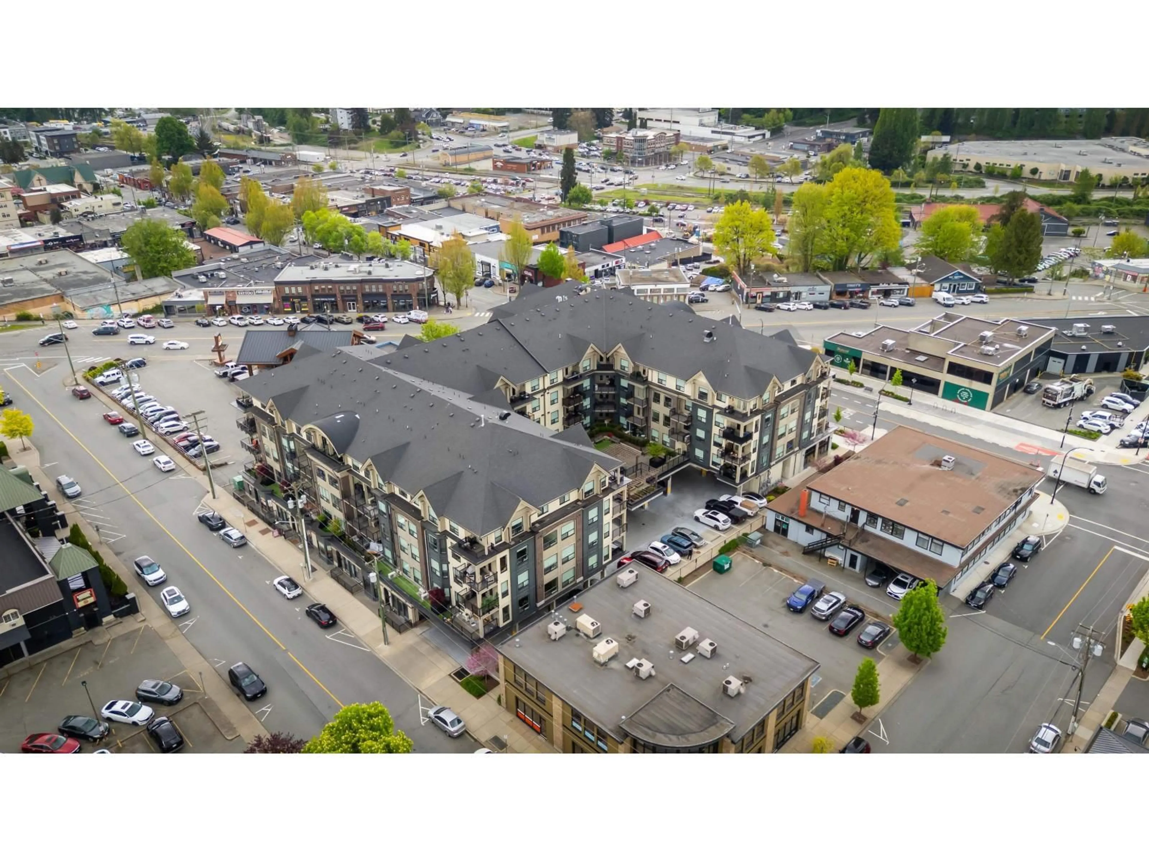A pic from outside/outdoor area/front of a property/back of a property/a pic from drone, unknown for 416-417 - 2493 MONTROSE AVENUE, Abbotsford British Columbia V2S3T2