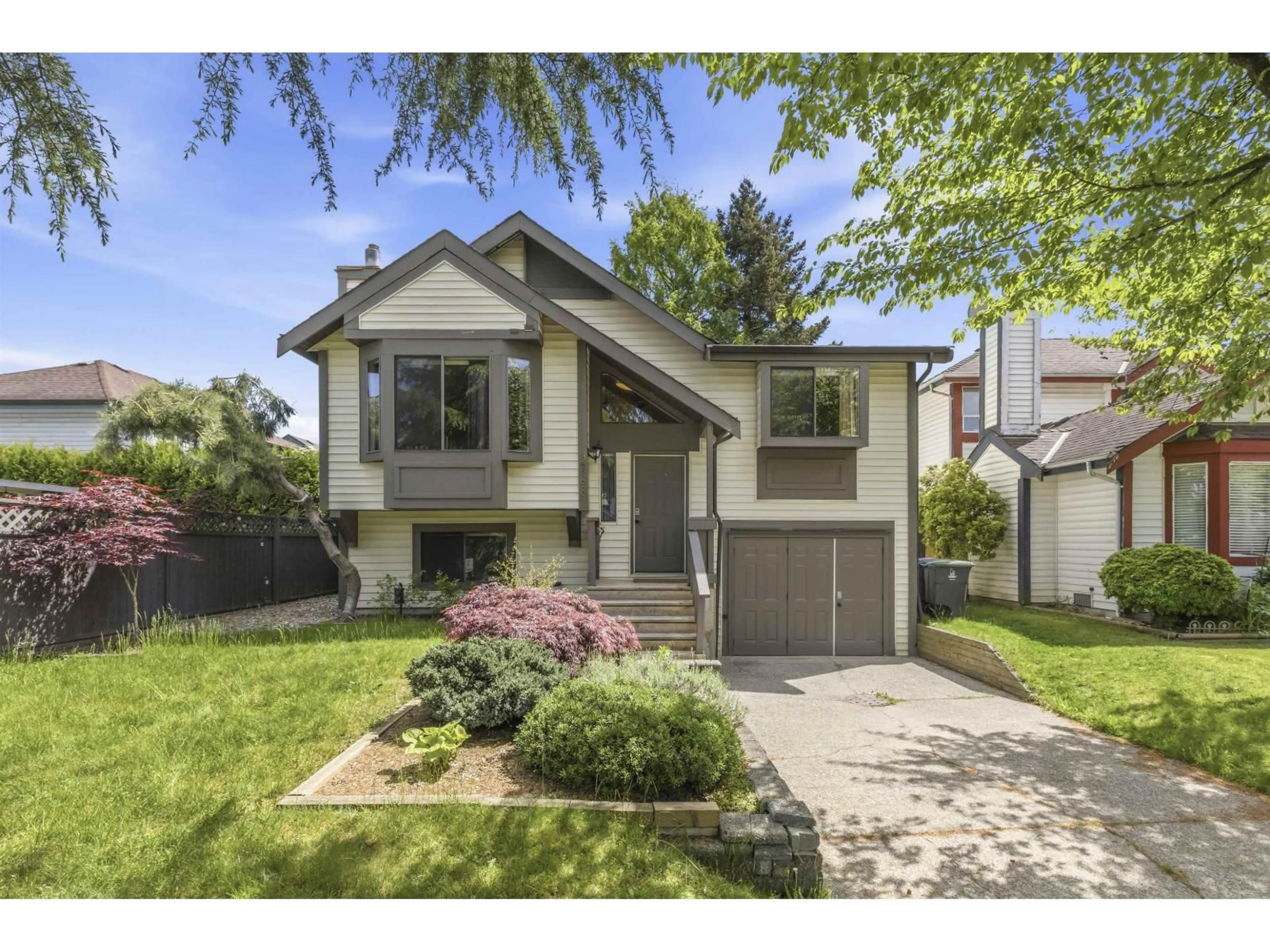 Home with vinyl exterior material, street for 9768 151A STREET, Surrey British Columbia V3R8W8