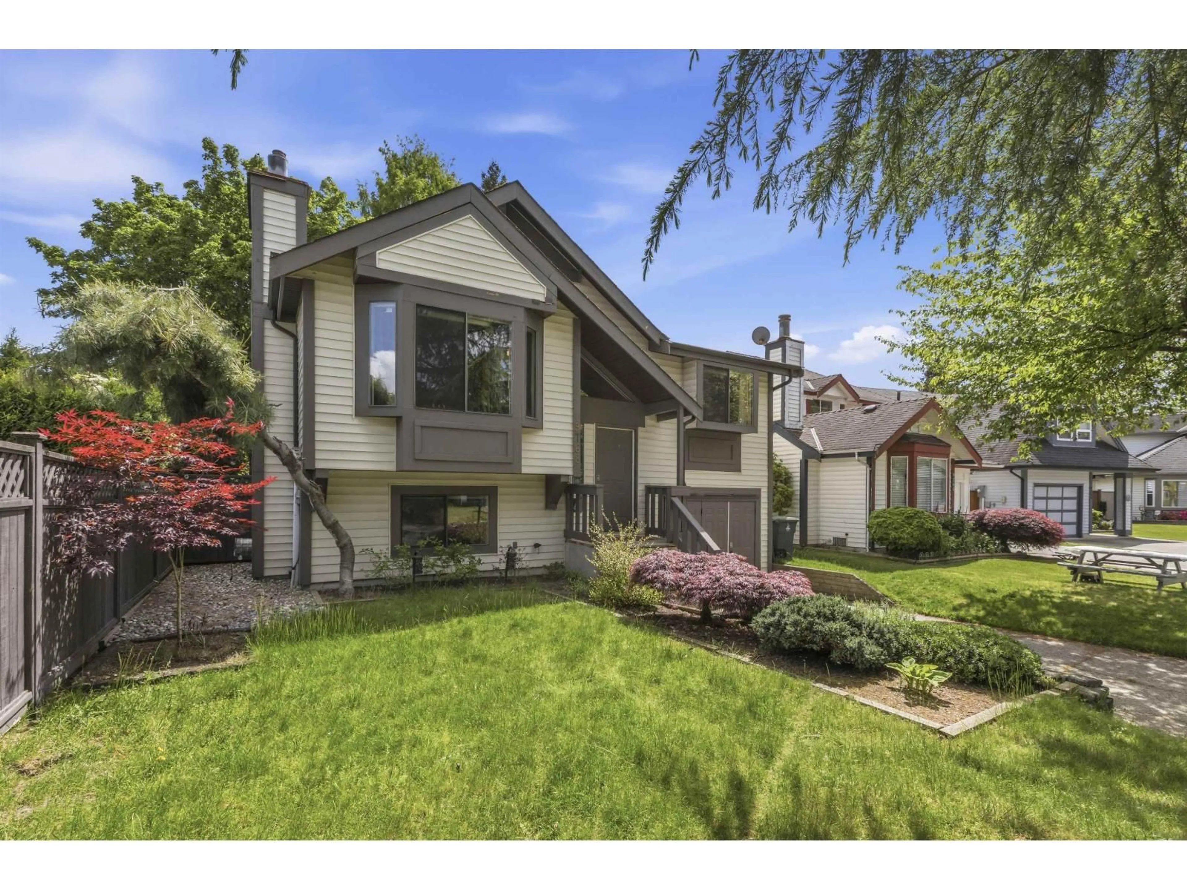 Home with vinyl exterior material, street for 9768 151A STREET, Surrey British Columbia V3R8W8