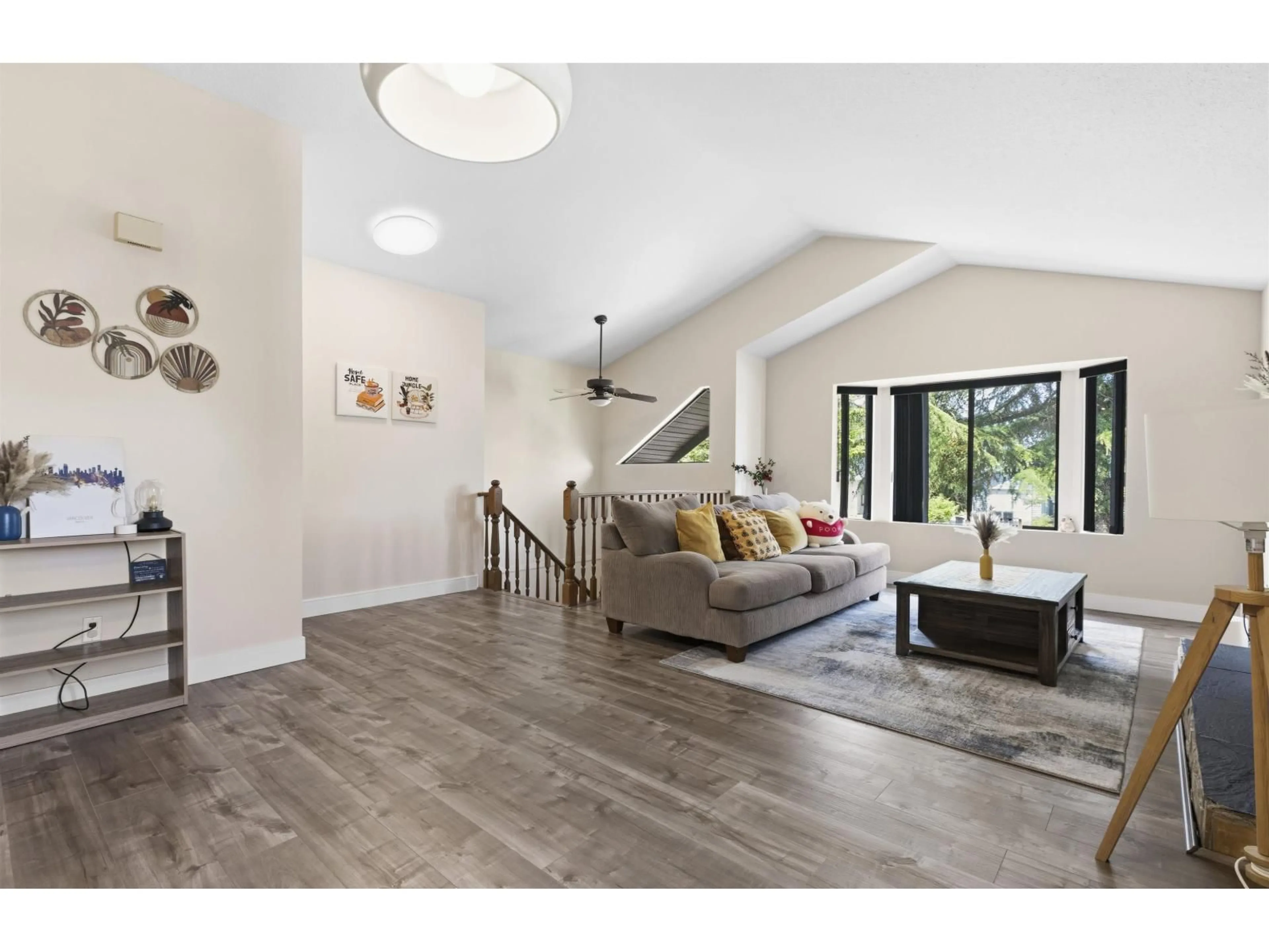 Living room with furniture, wood/laminate floor for 9768 151A STREET, Surrey British Columbia V3R8W8