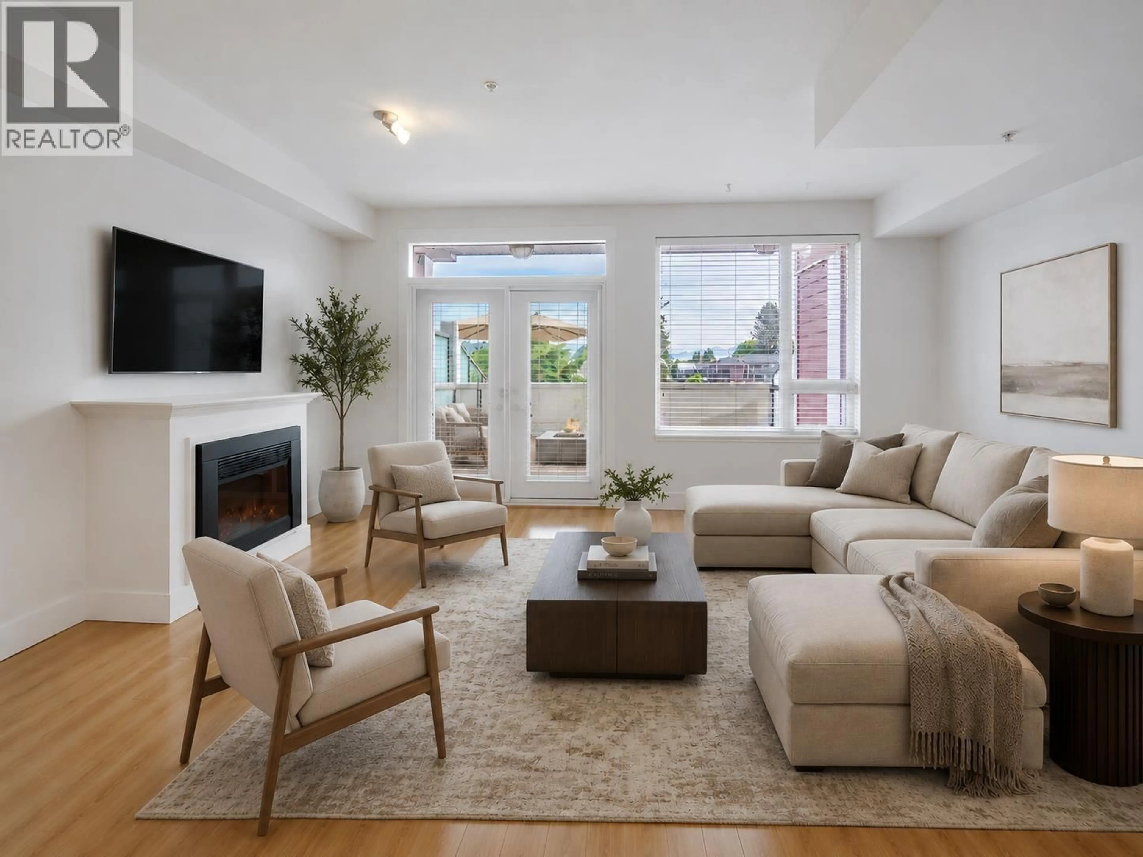Living room with furniture, unknown for 205 - 7908 GRAHAM AVENUE, Burnaby British Columbia V3N1V9