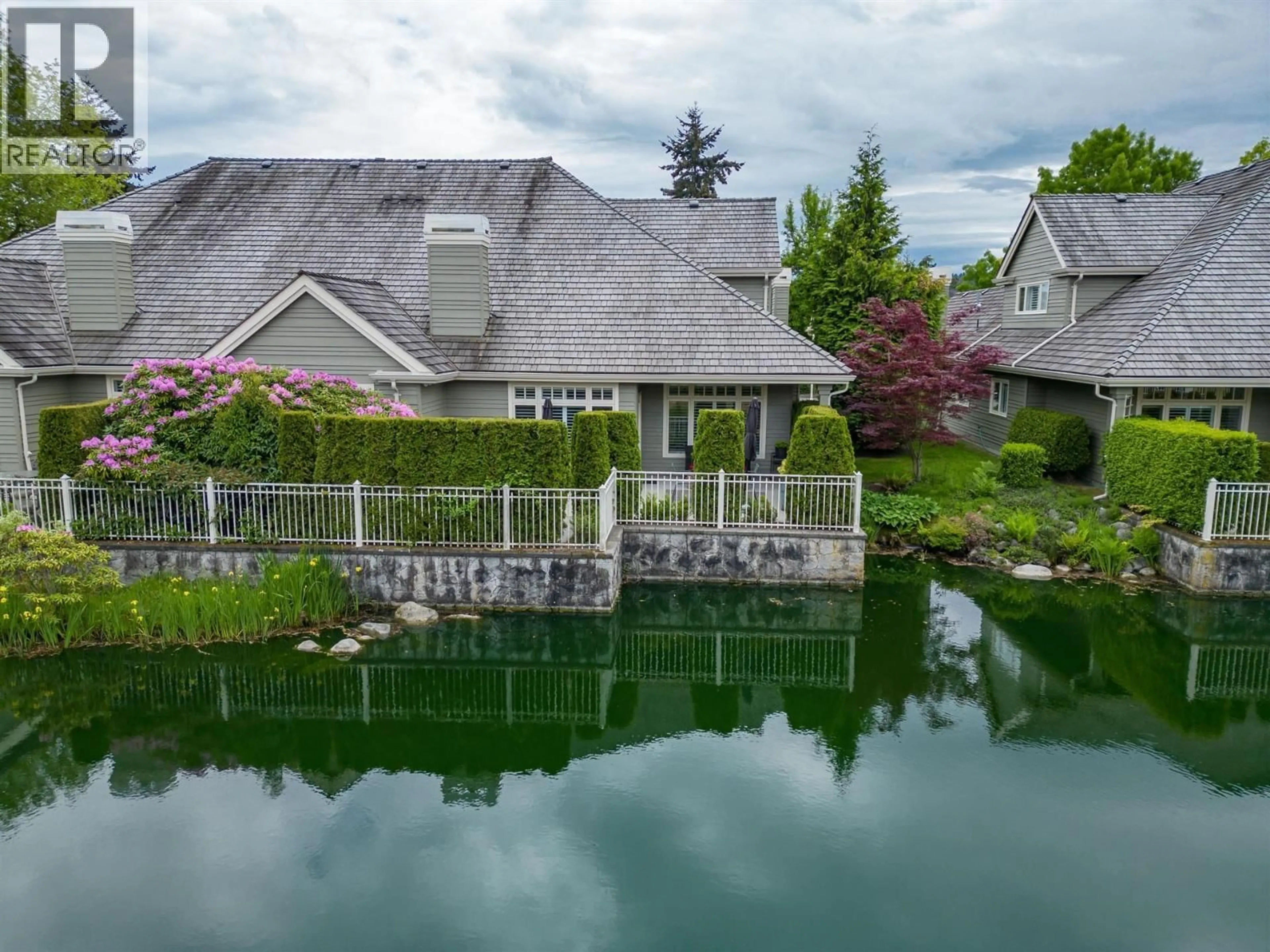 A pic from outside/outdoor area/front of a property/back of a property/a pic from drone, water/lake/river/ocean view for 303 - 6505 3 AVENUE, Delta British Columbia V4L2N1