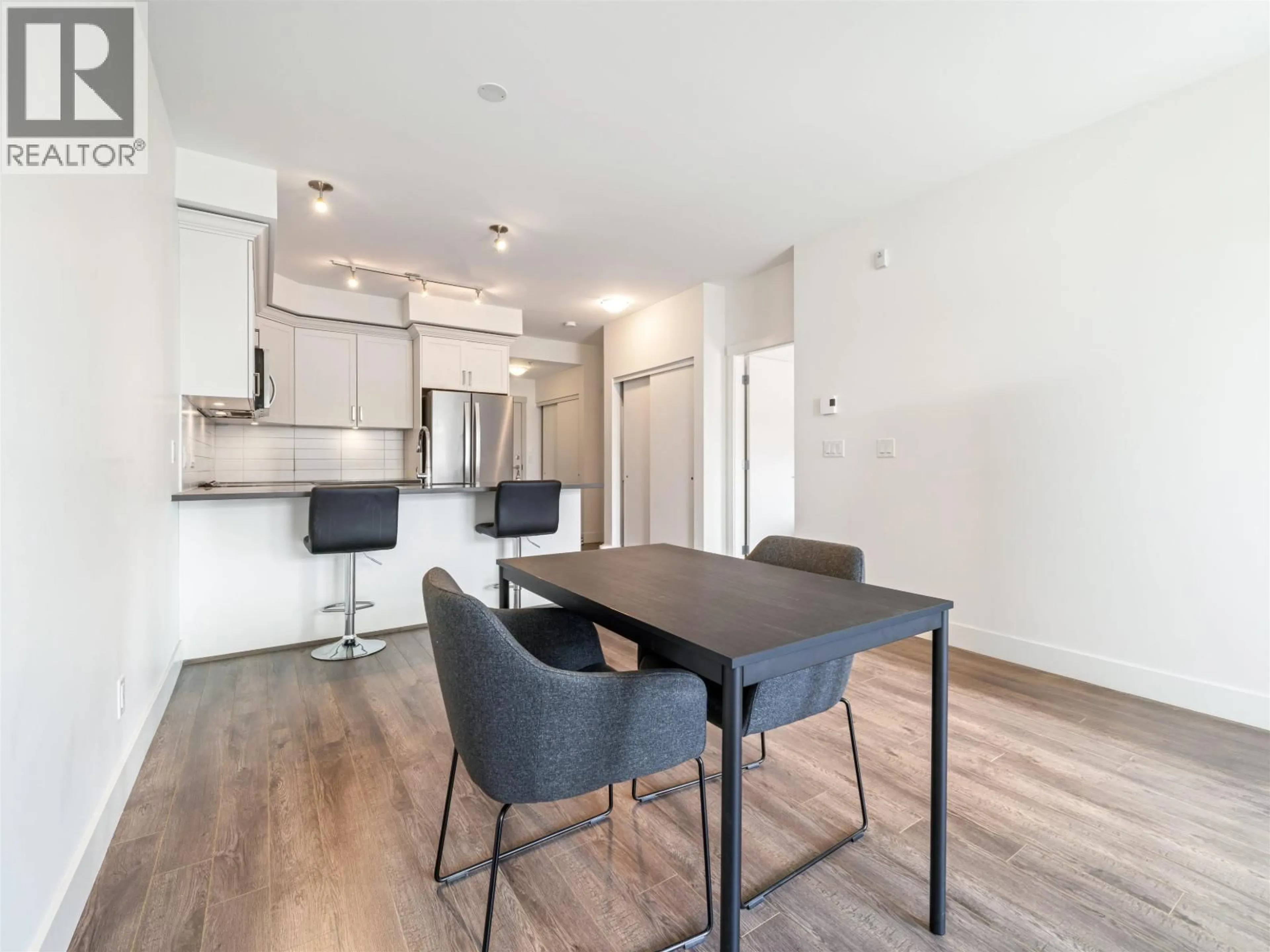 Open concept kitchen, wood/laminate floor for 314 - 2436 KELLY AVENUE, Port Coquitlam British Columbia V3C1Y4
