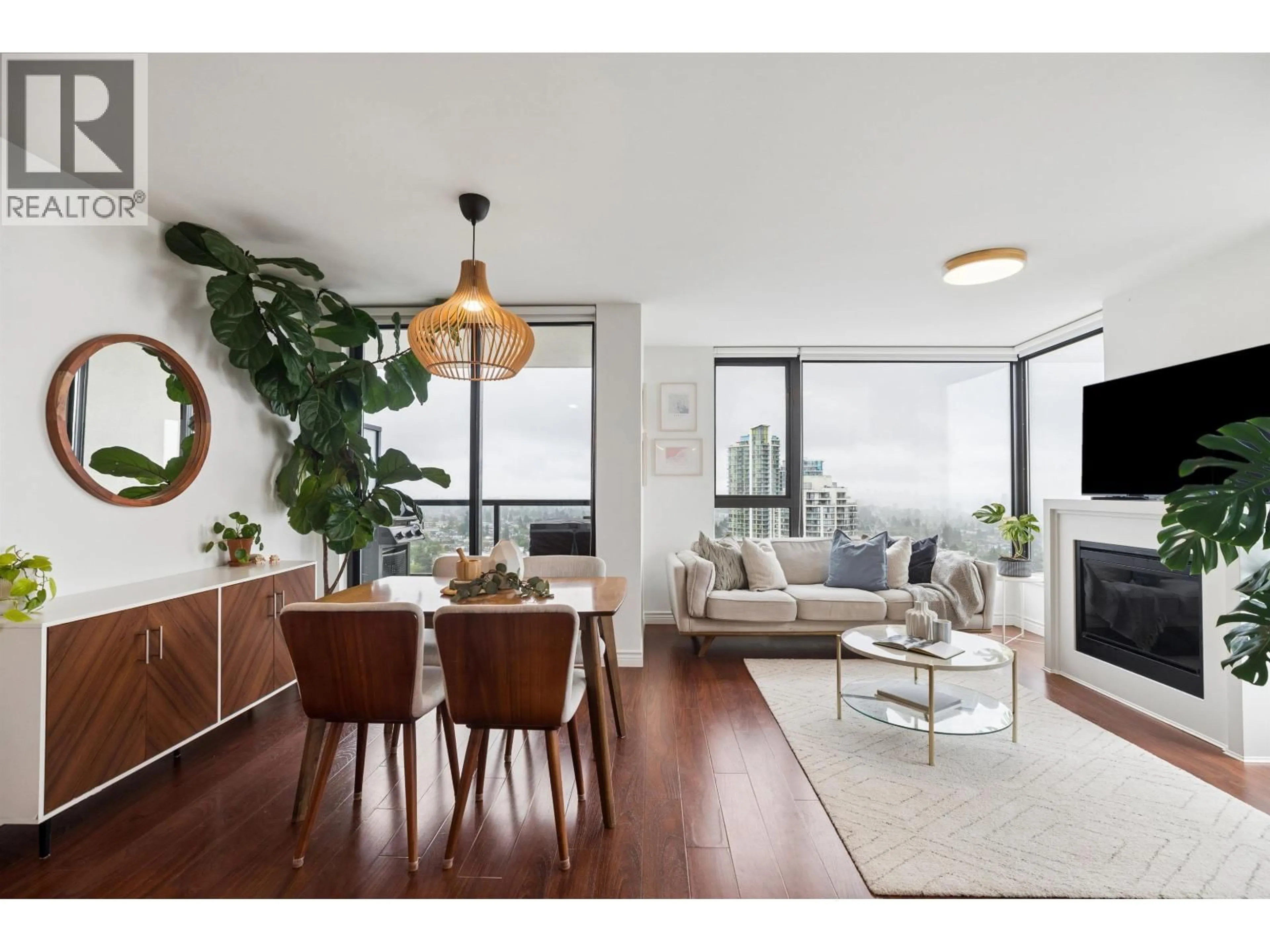 Living room with furniture, wood/laminate floor for 2706 - 7063 HALL AVENUE, Burnaby British Columbia V5E0A5