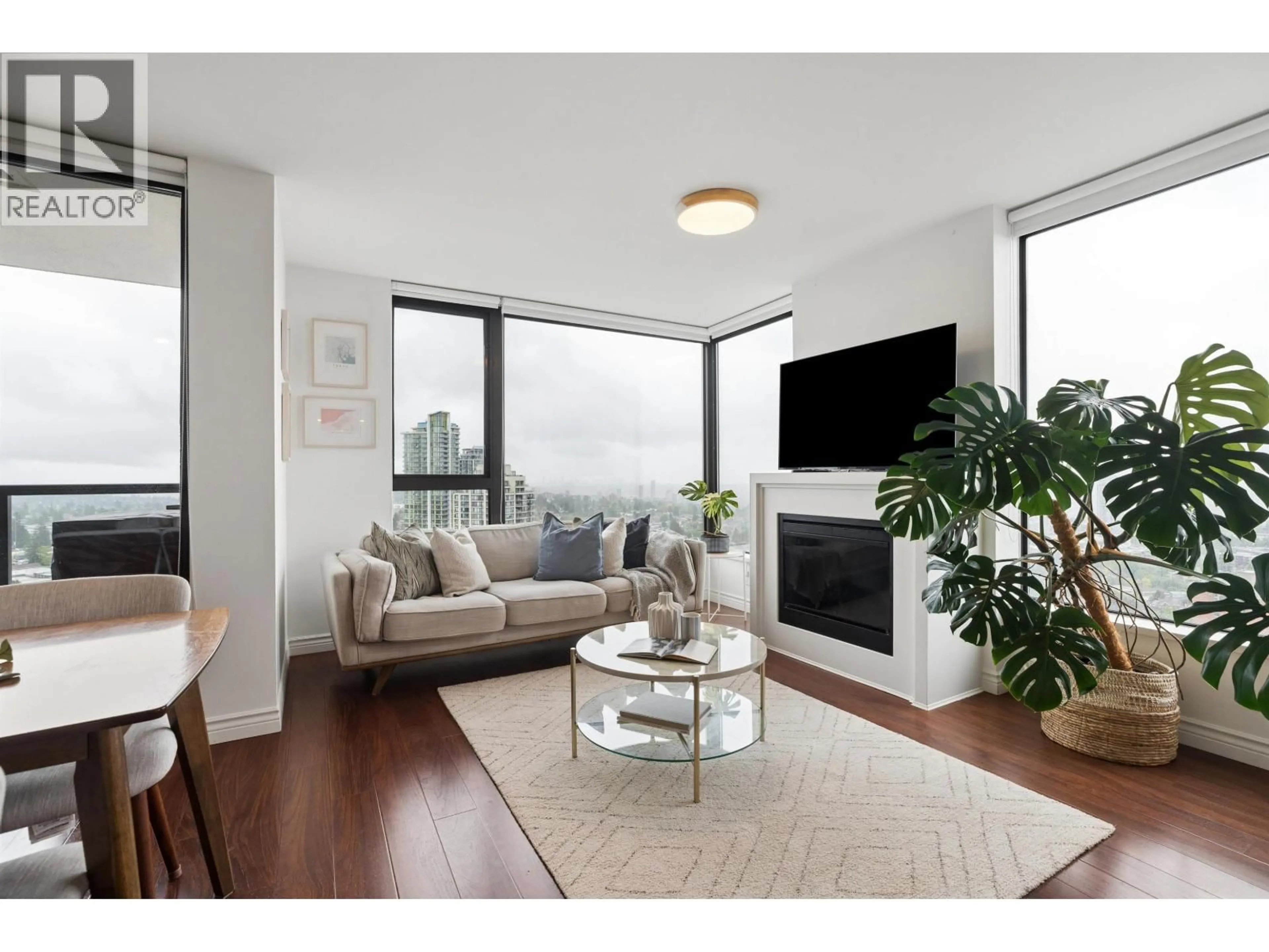 Living room with furniture, wood/laminate floor for 2706 - 7063 HALL AVENUE, Burnaby British Columbia V5E0A5