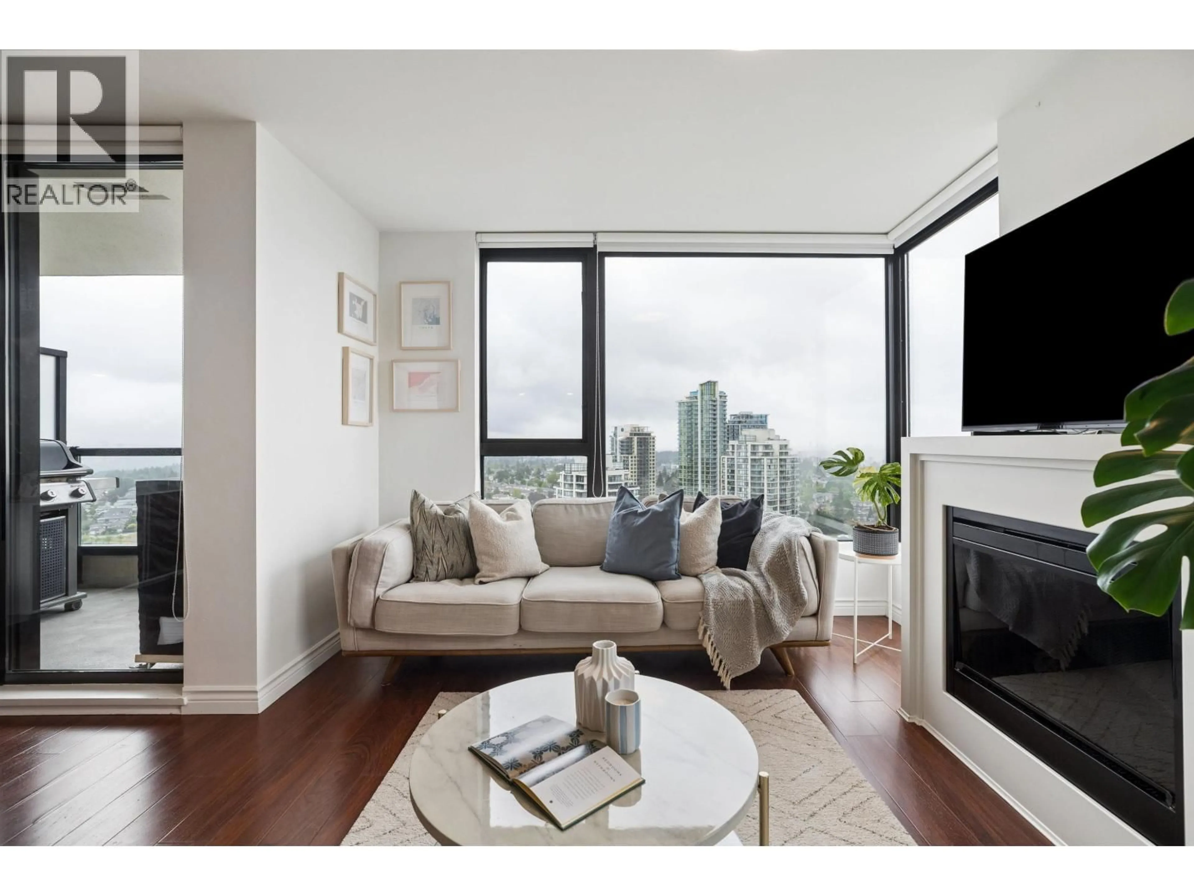 Living room with furniture, wood/laminate floor for 2706 - 7063 HALL AVENUE, Burnaby British Columbia V5E0A5