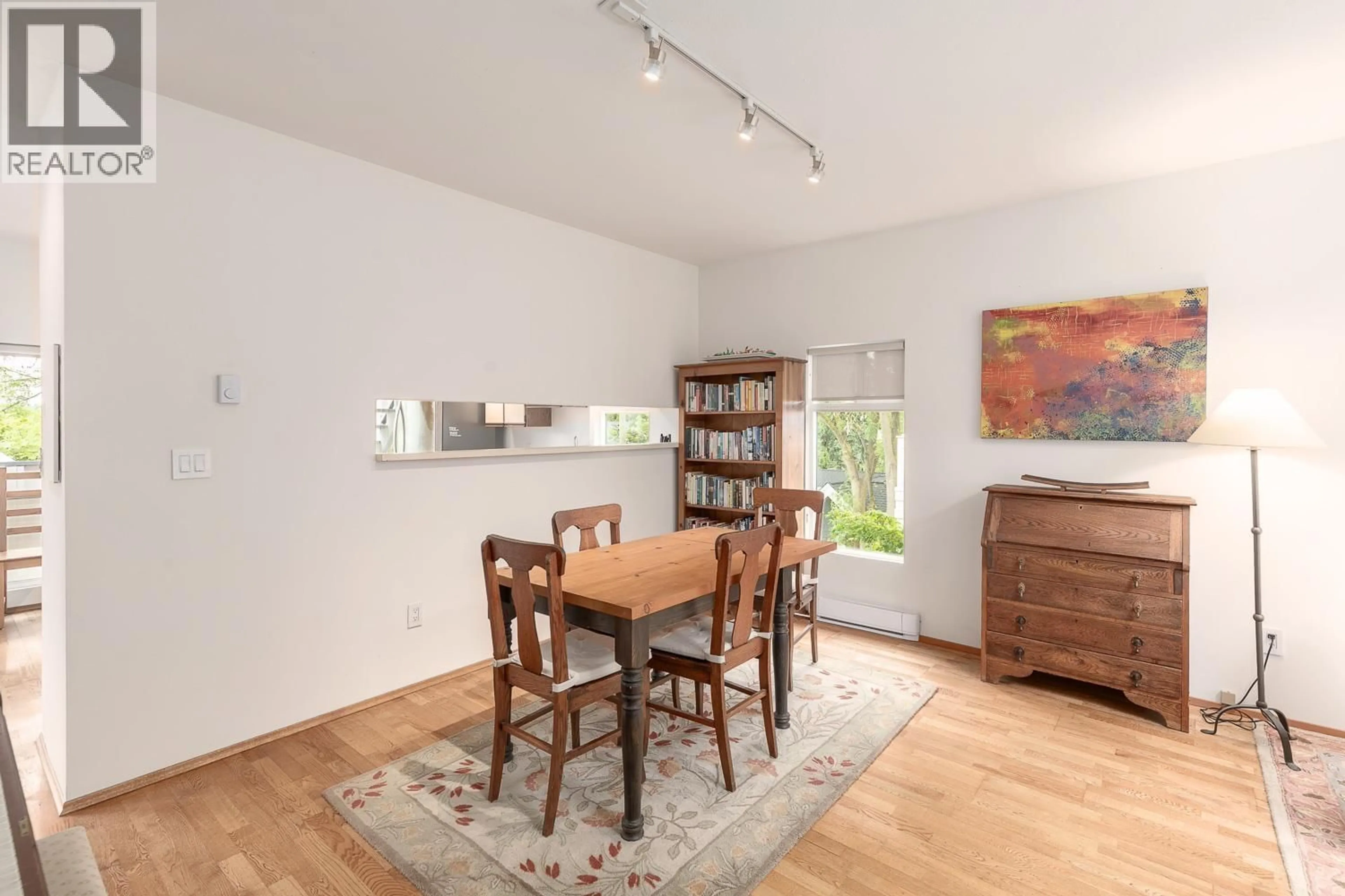 Dining room, wood/laminate floor for 2546 2ND AVENUE, Vancouver British Columbia V6K1J8