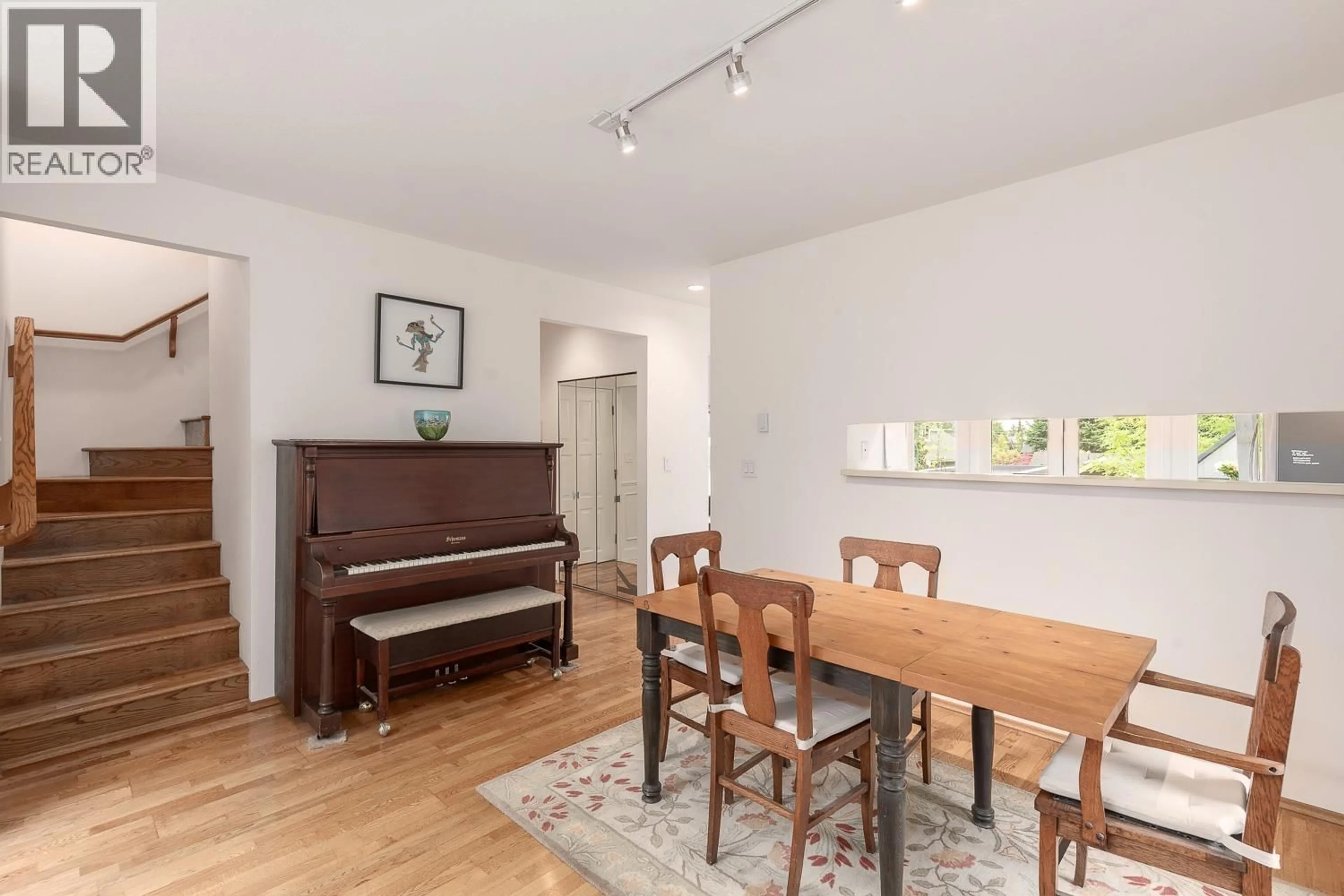 Dining room, wood/laminate floor for 2546 2ND AVENUE, Vancouver British Columbia V6K1J8