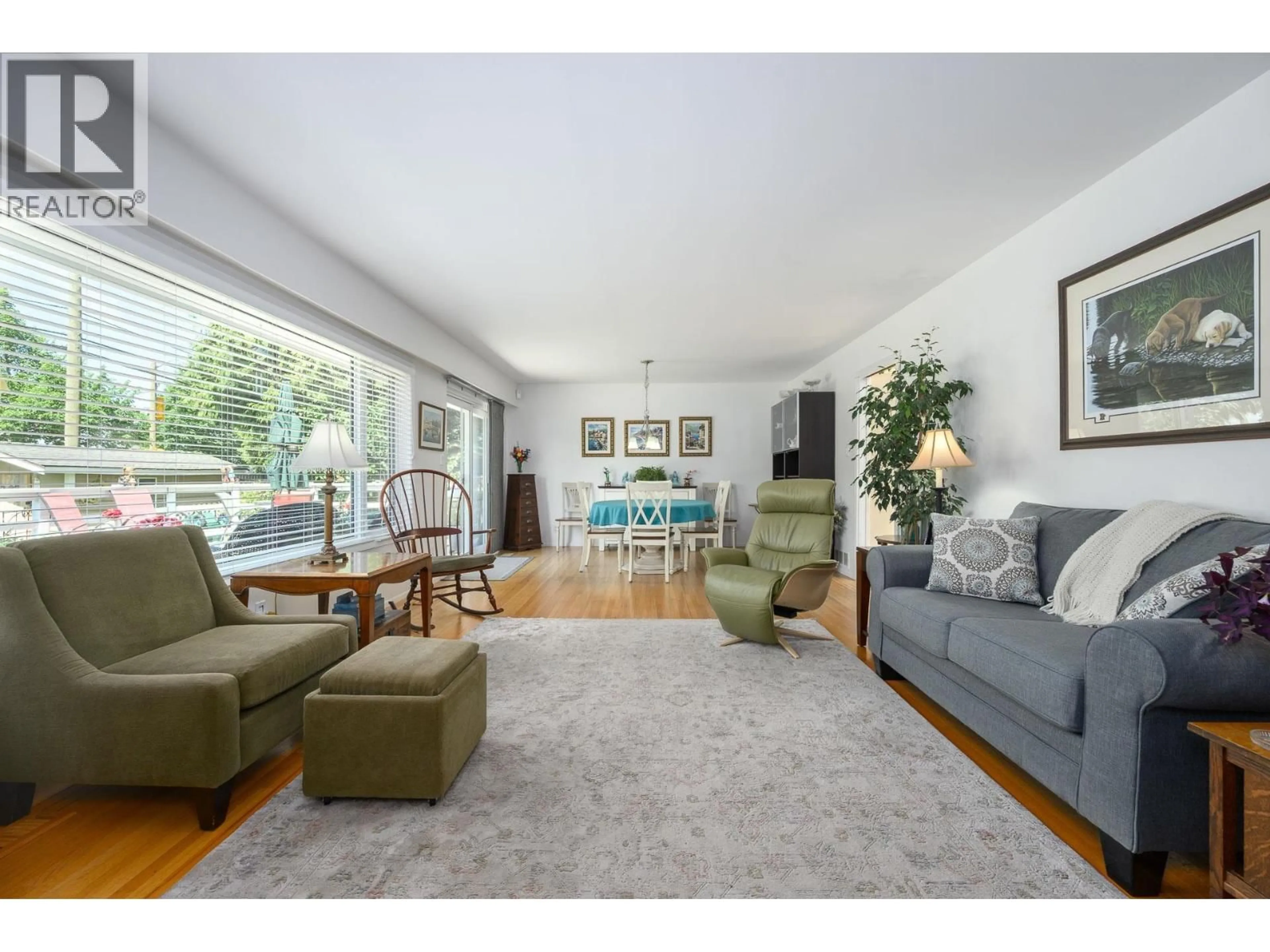 Living room with furniture, wood/laminate floor for 957 56A STREET, Delta British Columbia V4L1Y6