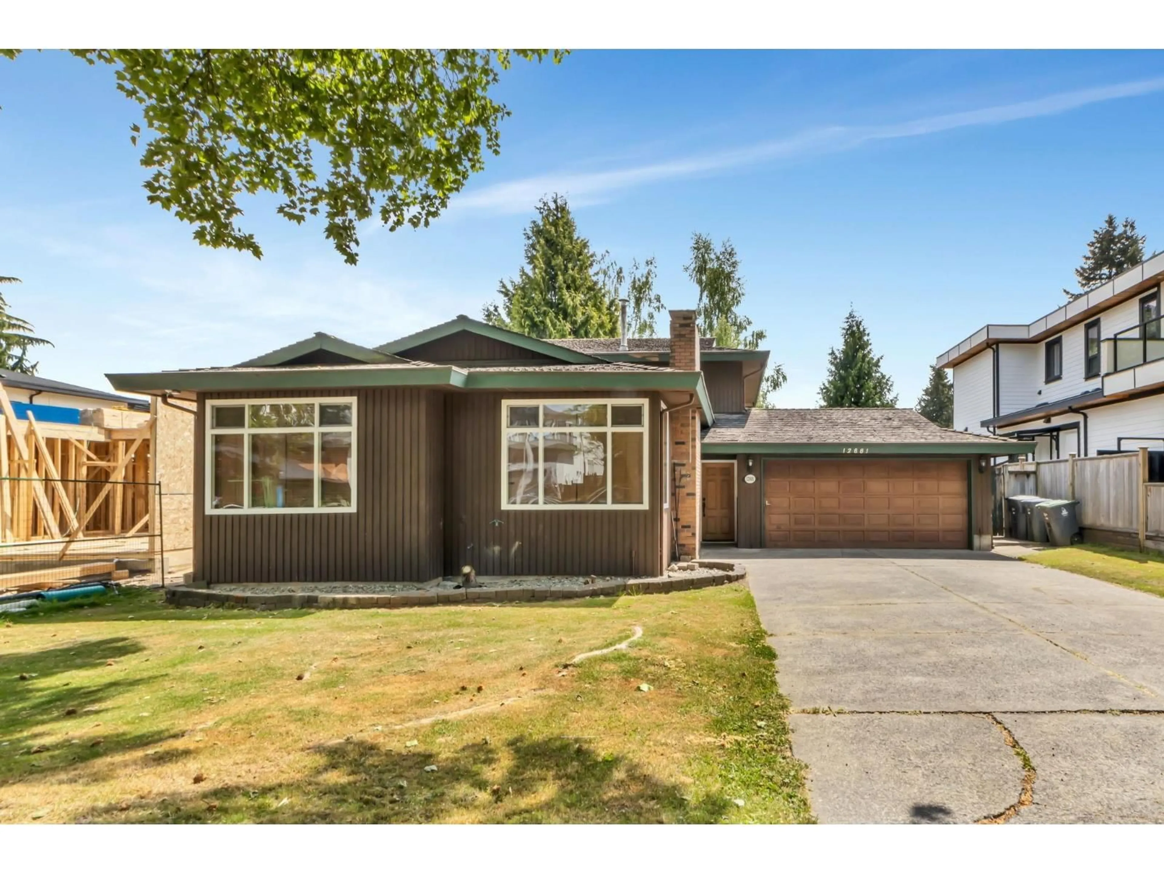 Home with vinyl exterior material, street for 12881 CARLUKE CRESCENT, Surrey British Columbia V3V6Y9
