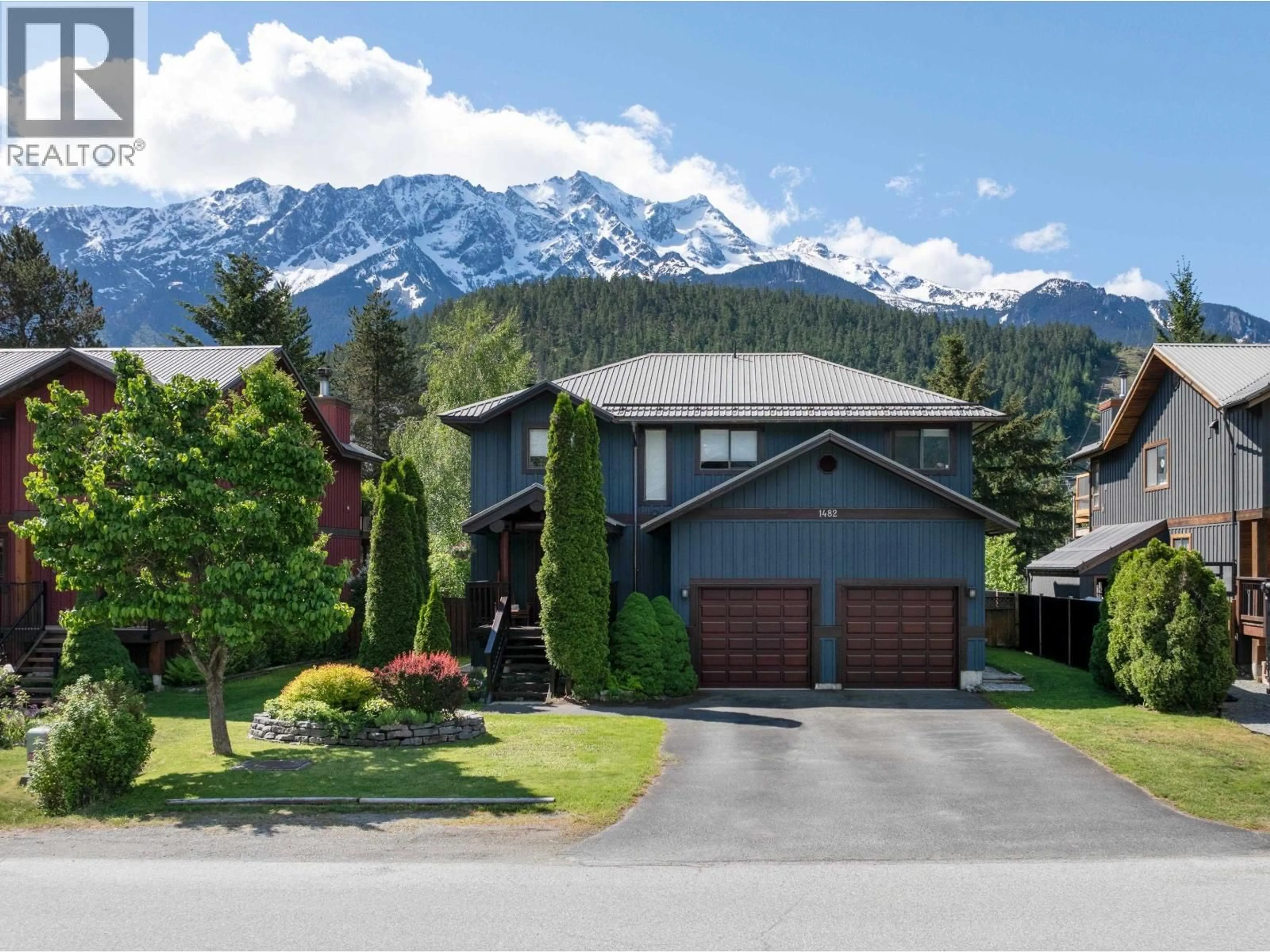 A pic from outside/outdoor area/front of a property/back of a property/a pic from drone, mountain view for 1482 BALSAM STREET, Pemberton British Columbia V0N2L0