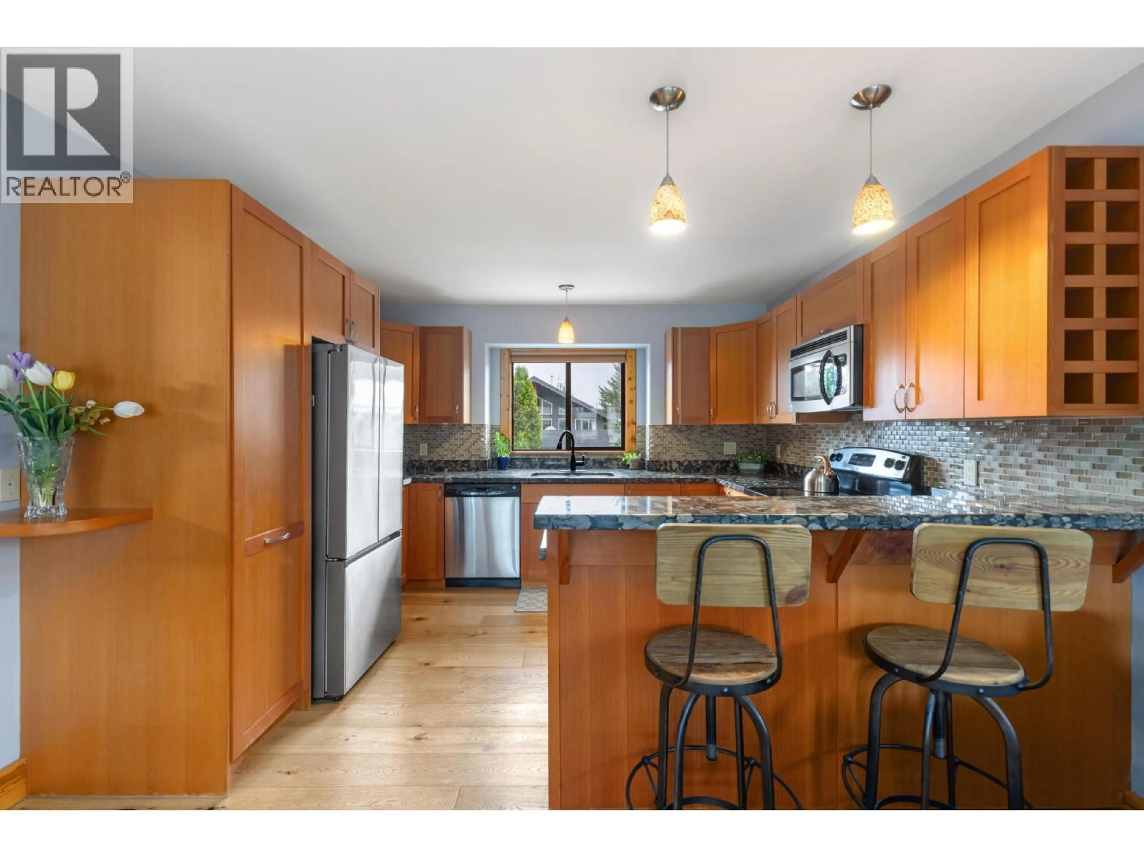 Open concept kitchen, unknown for 1482 BALSAM STREET, Pemberton British Columbia V0N2L0