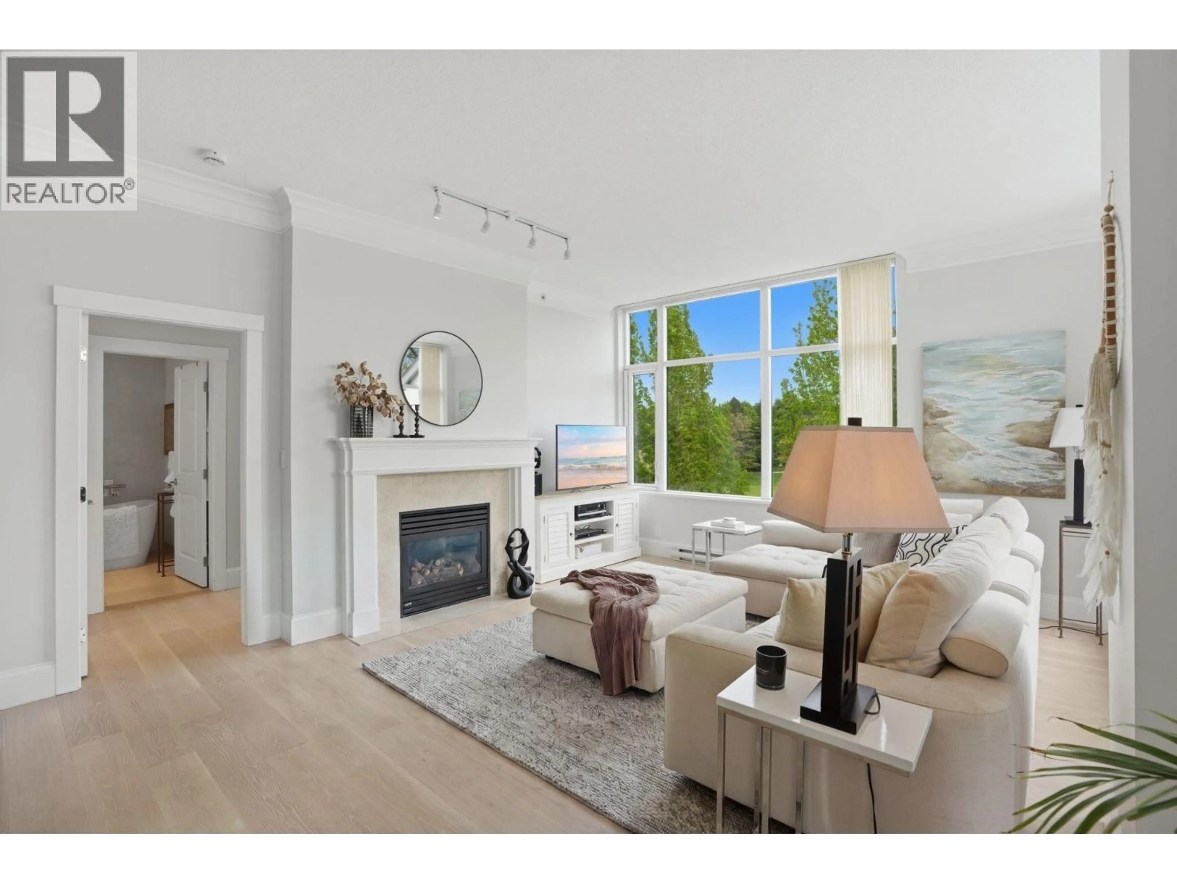 Living room with furniture, wood/laminate floor for PH711 - 4759 VALLEY DRIVE, Vancouver British Columbia V6J4B7