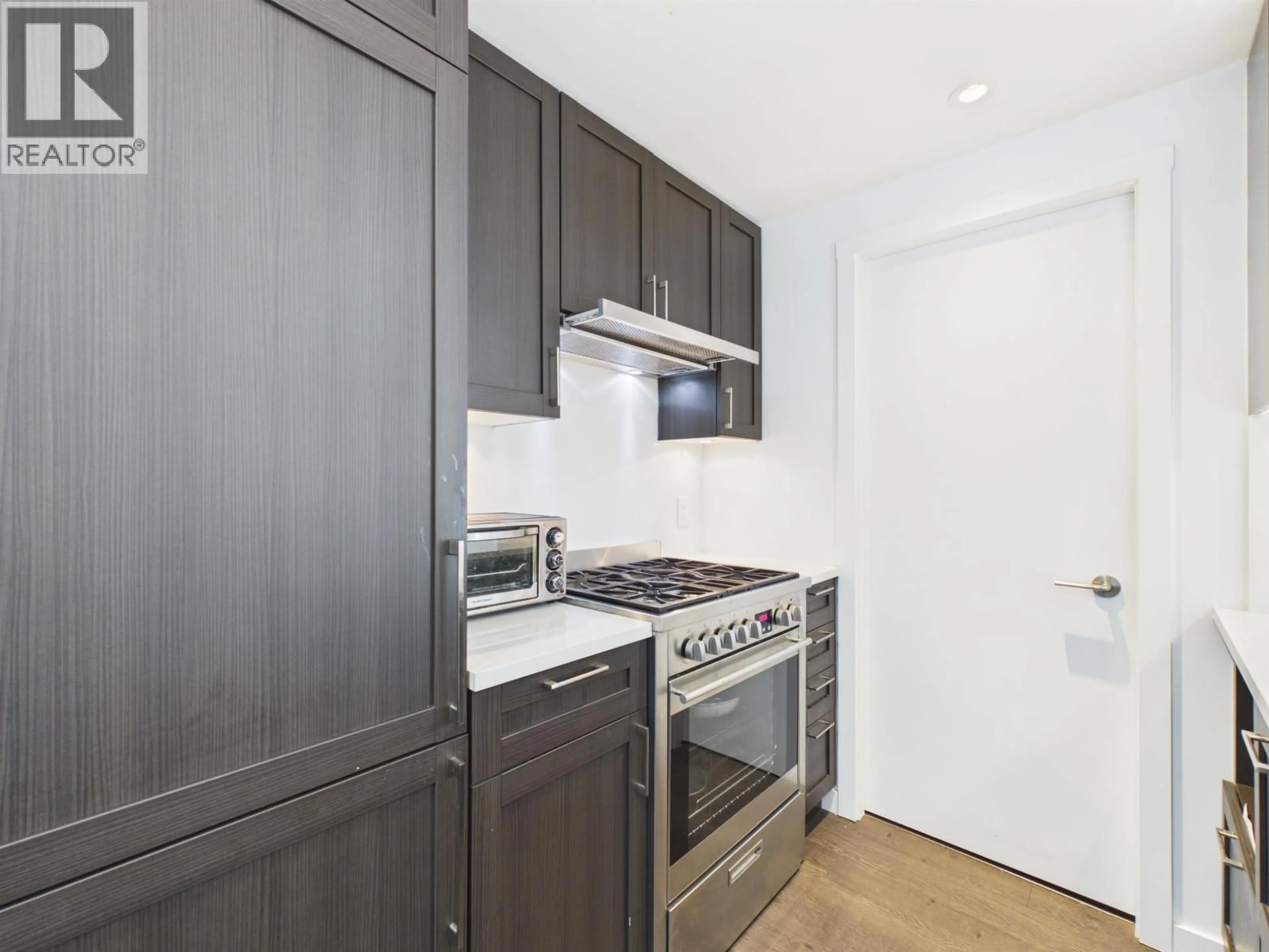 Standard kitchen, wood/laminate floor for 2202 - 5515 BOUNDARY ROAD, Vancouver British Columbia V5R0E3