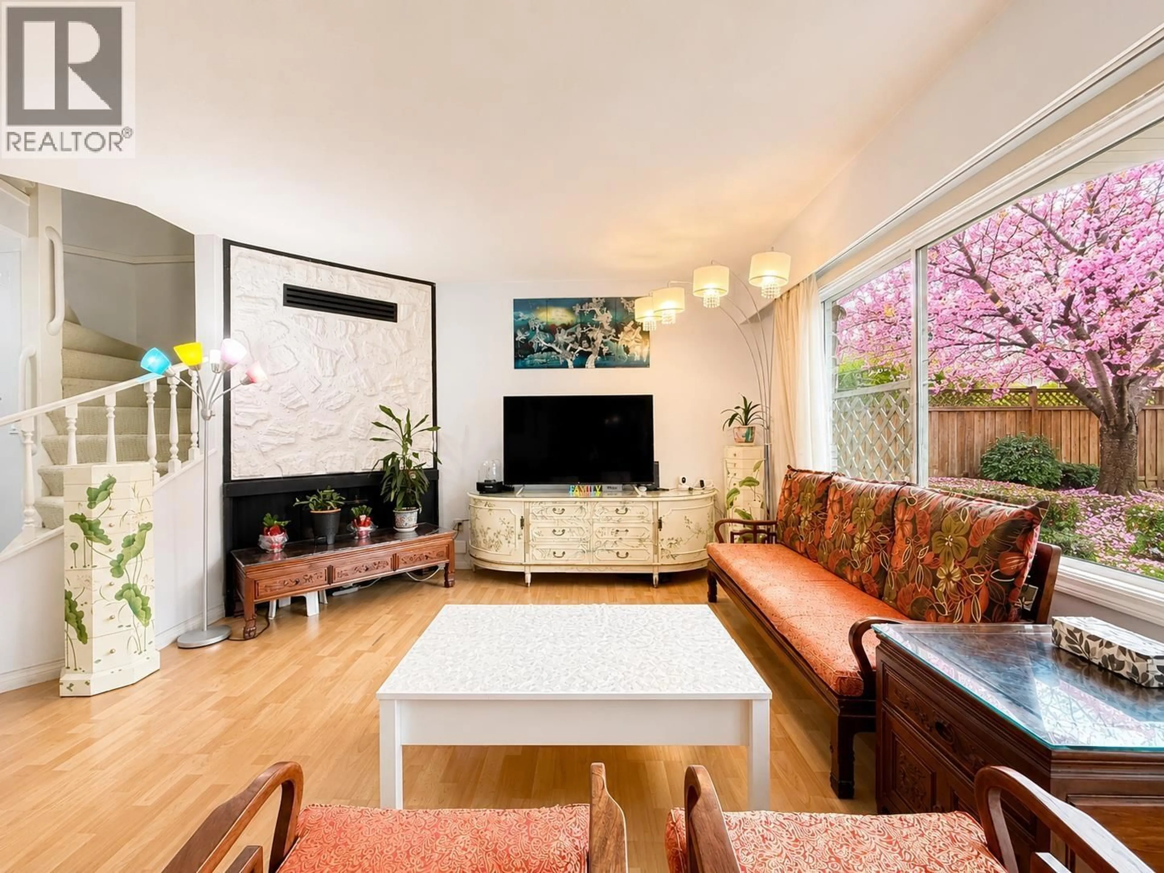 Living room with furniture, wood/laminate floor for 27 - 10011 SWINTON CRESCENT, Richmond British Columbia V7A3S9