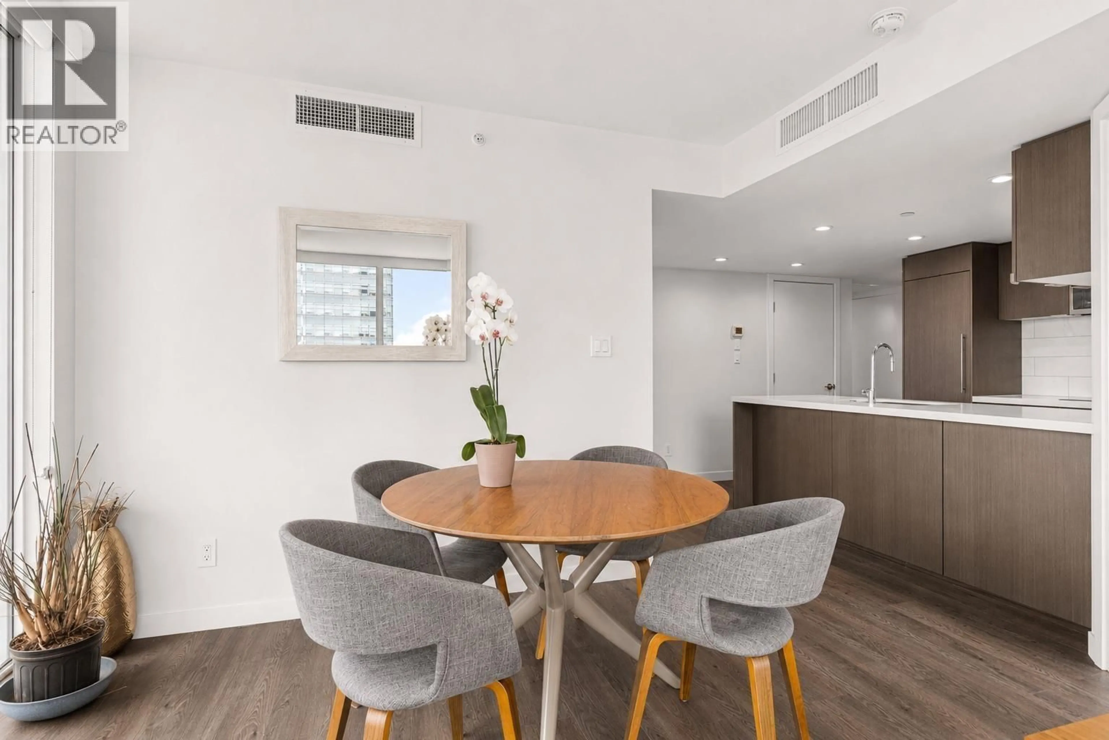 Dining room, wood/laminate floor for 1408 - 8189 CAMBIE STREET, Vancouver British Columbia V6P0G6