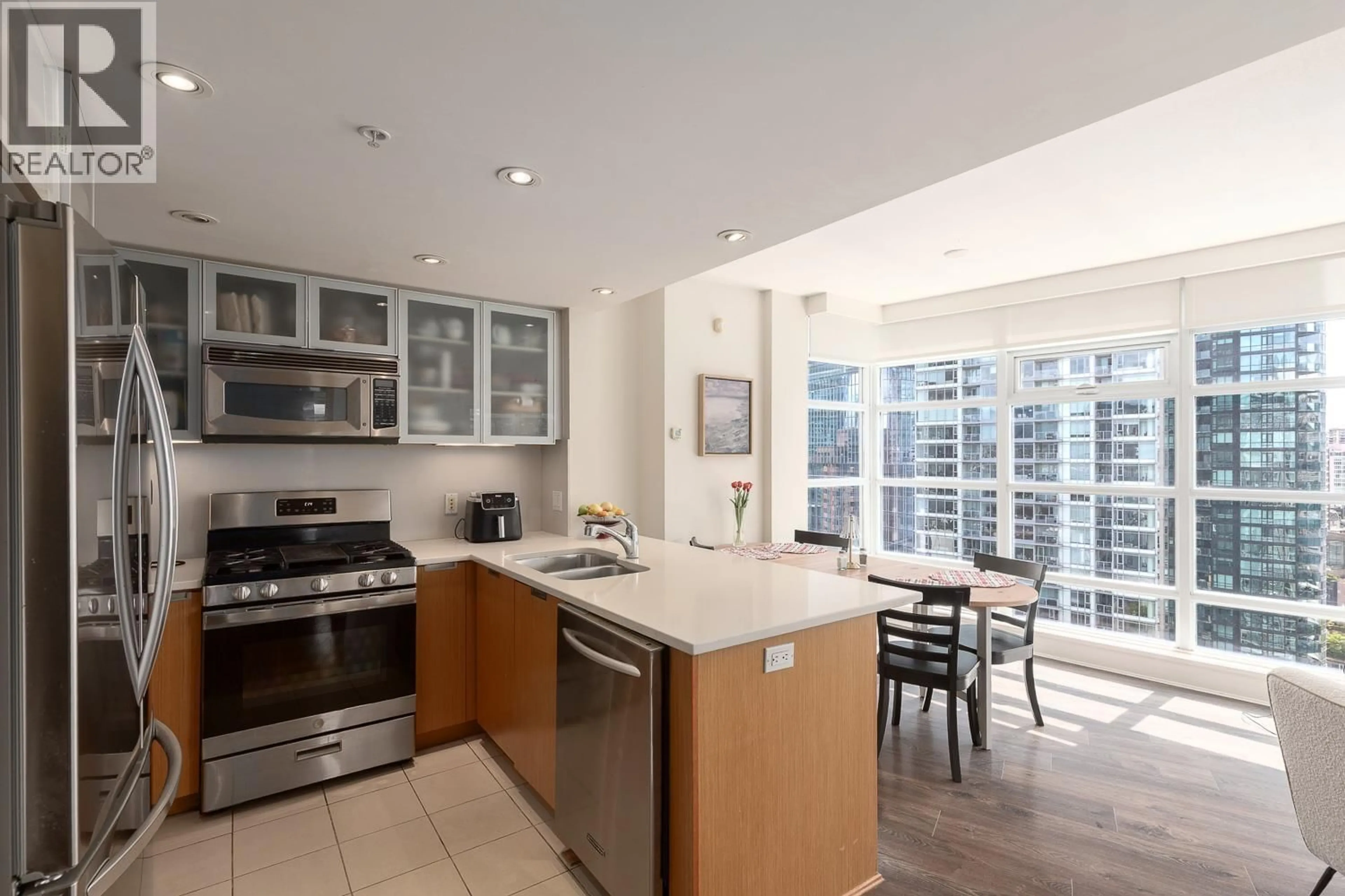 Open concept kitchen, ceramic/tile floor for 2405 - 1205 HASTINGS STREET, Vancouver British Columbia V6E4T7