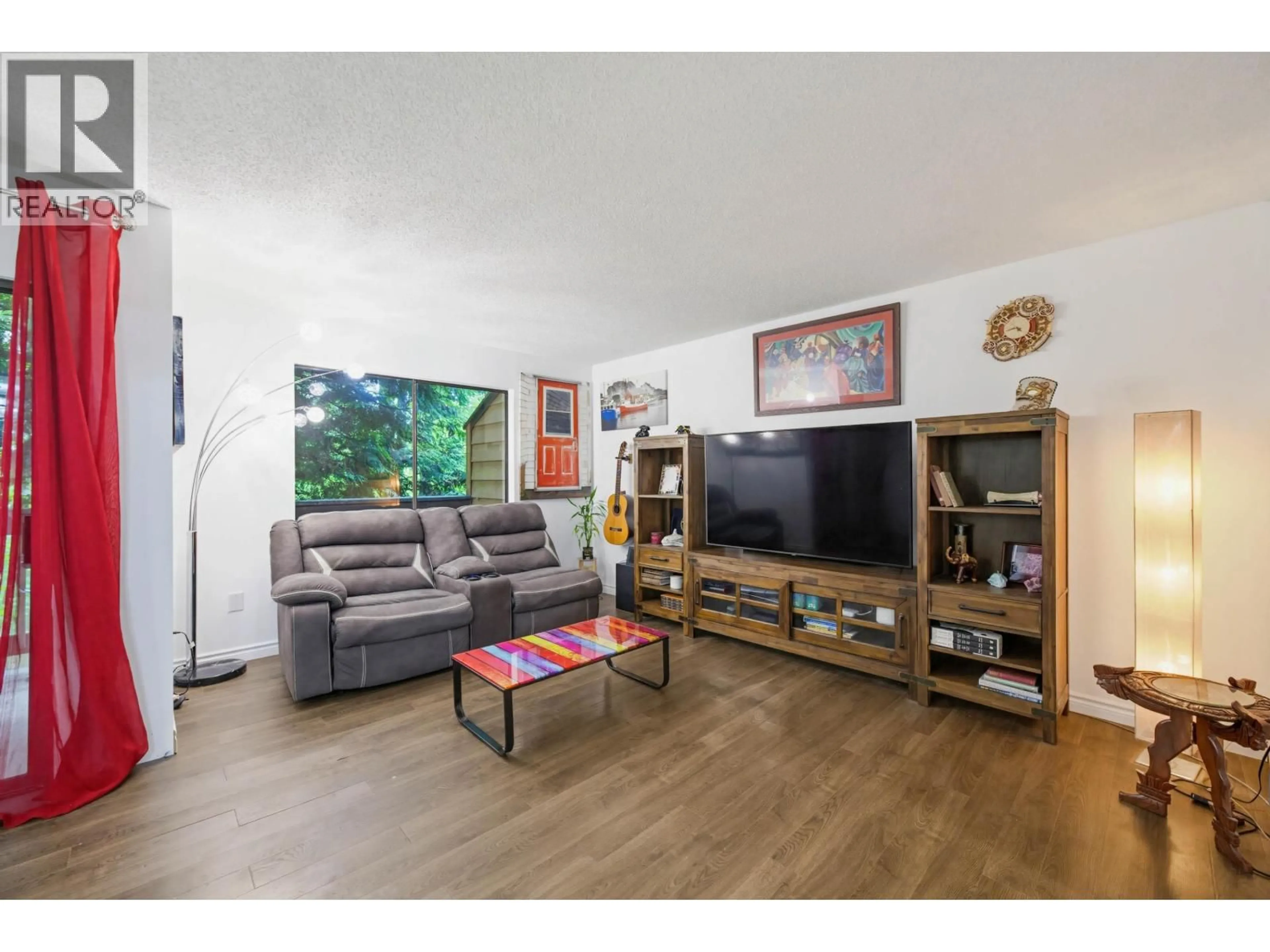 Living room with furniture, wood/laminate floor for 320 CORNELL WAY, Port Moody British Columbia V3H3W2