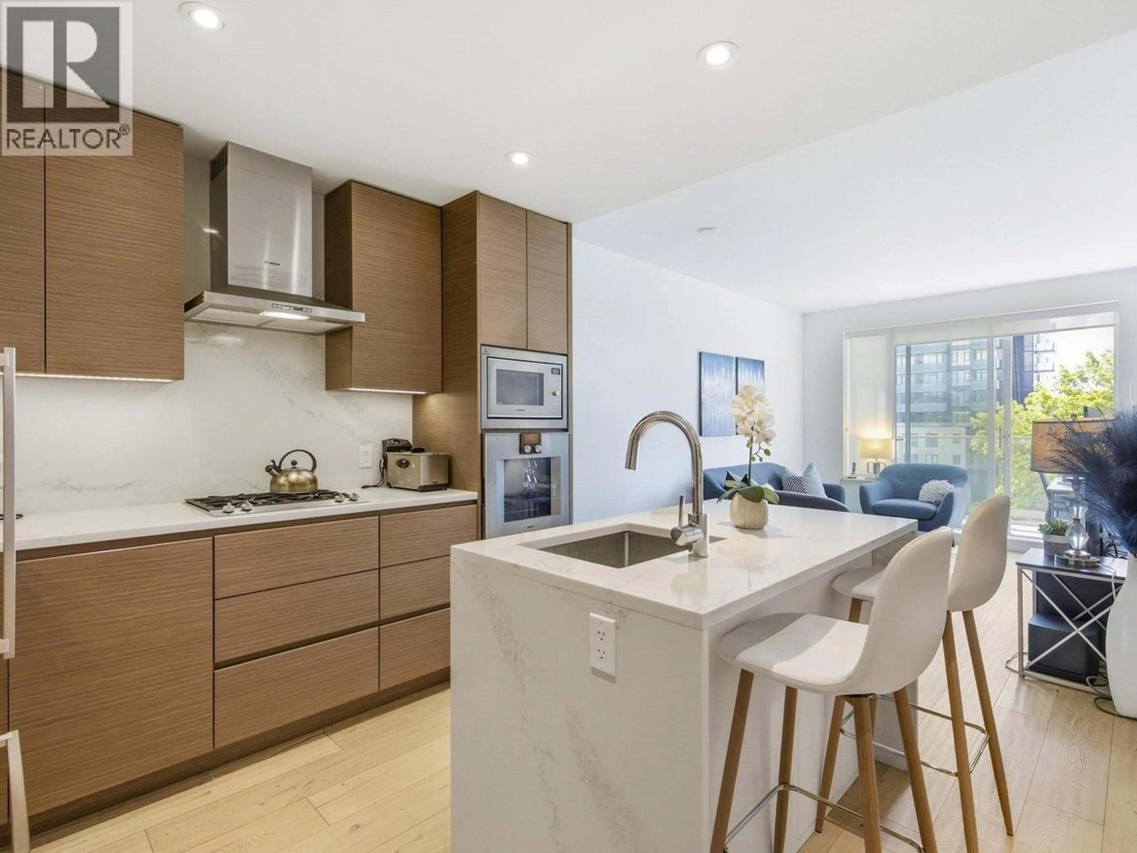 Open concept kitchen, ceramic/tile floor for 402 - 5693 ELIZABETH STREET, Vancouver British Columbia V5Y3K1