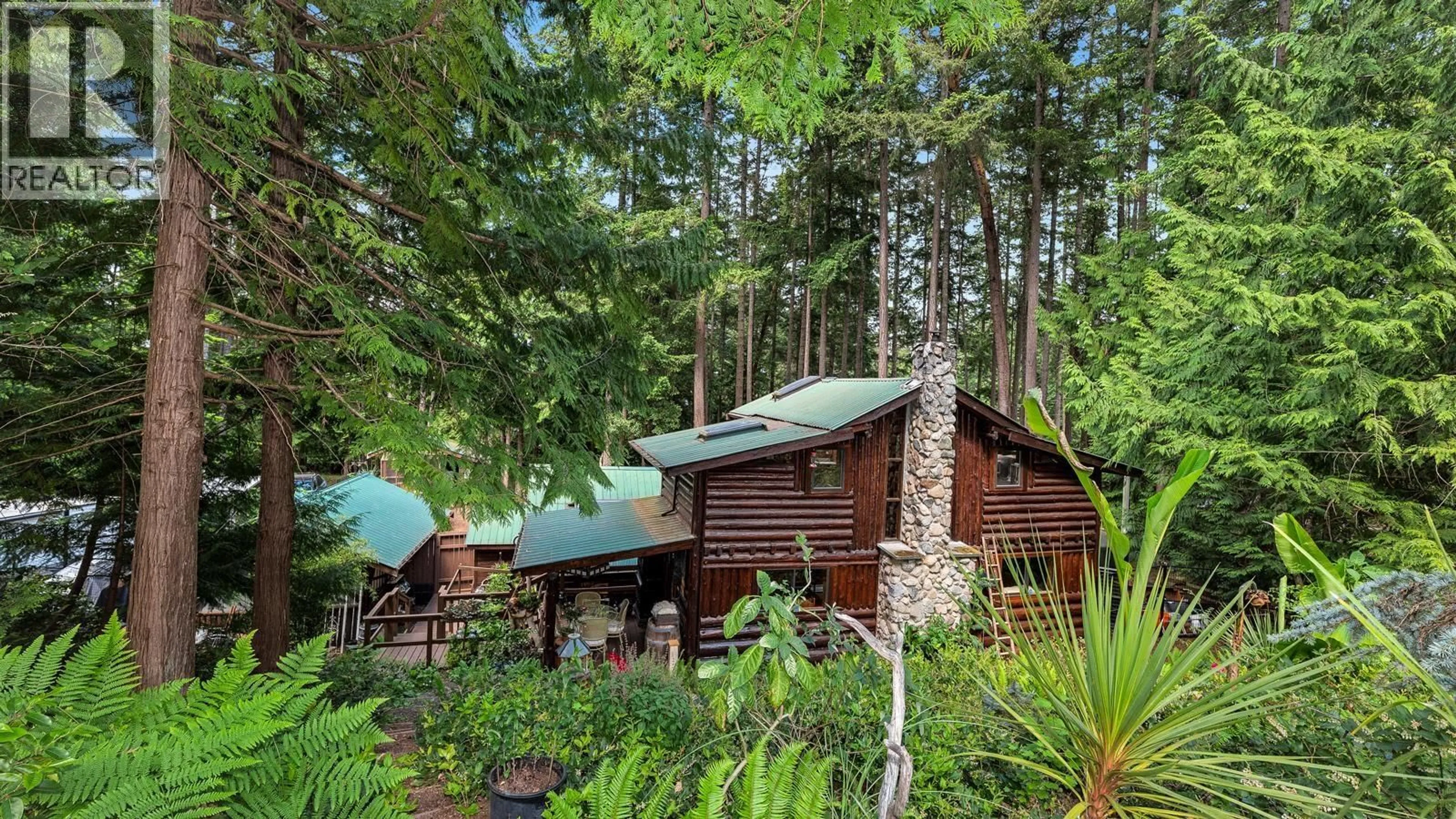 Patio, forest/trees view for 604 WAUGH ROAD, Mayne Island British Columbia V0N2J1
