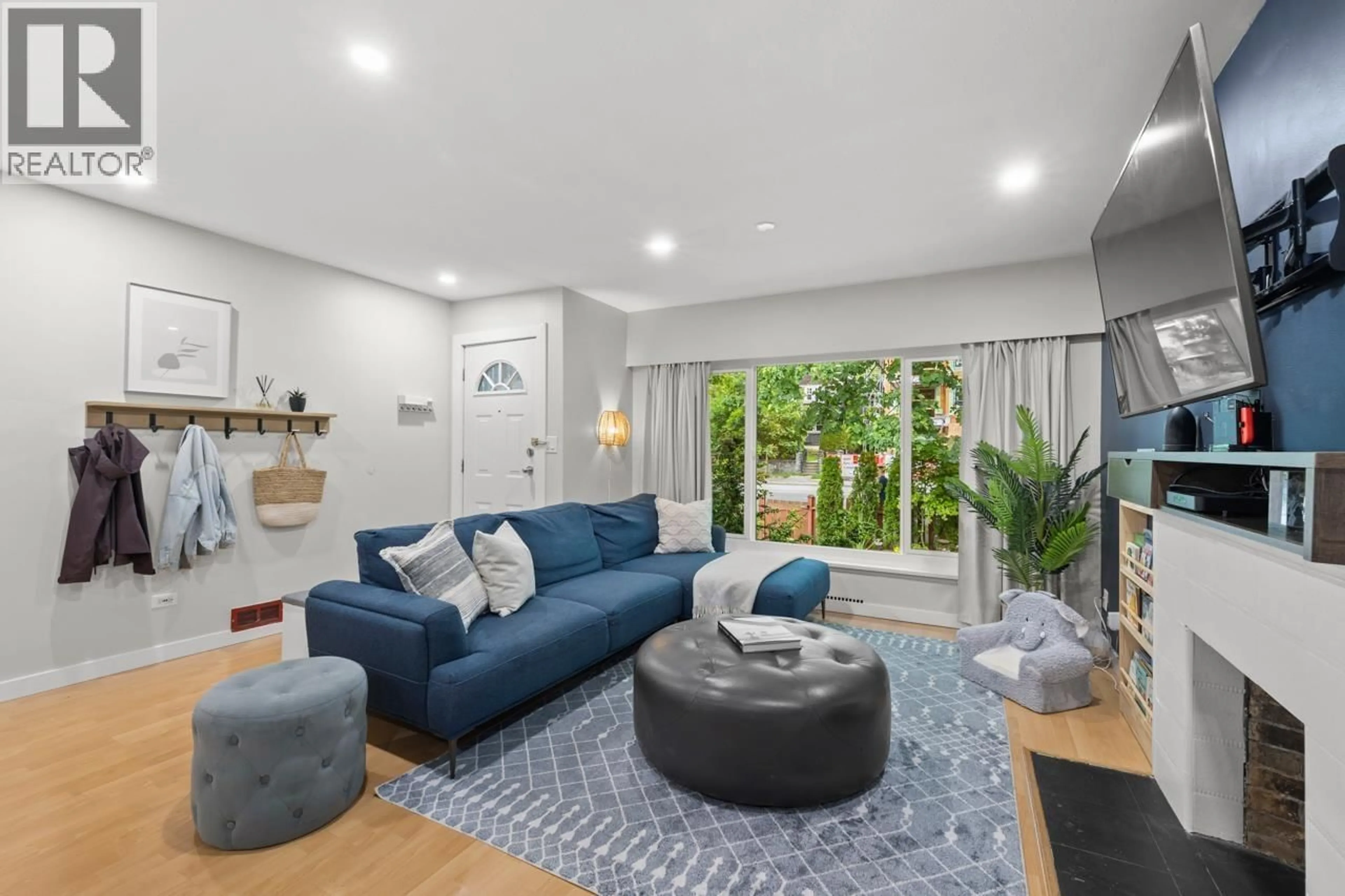 Living room with furniture, unknown for 2036 BROADWAY, Vancouver British Columbia V5N1W7