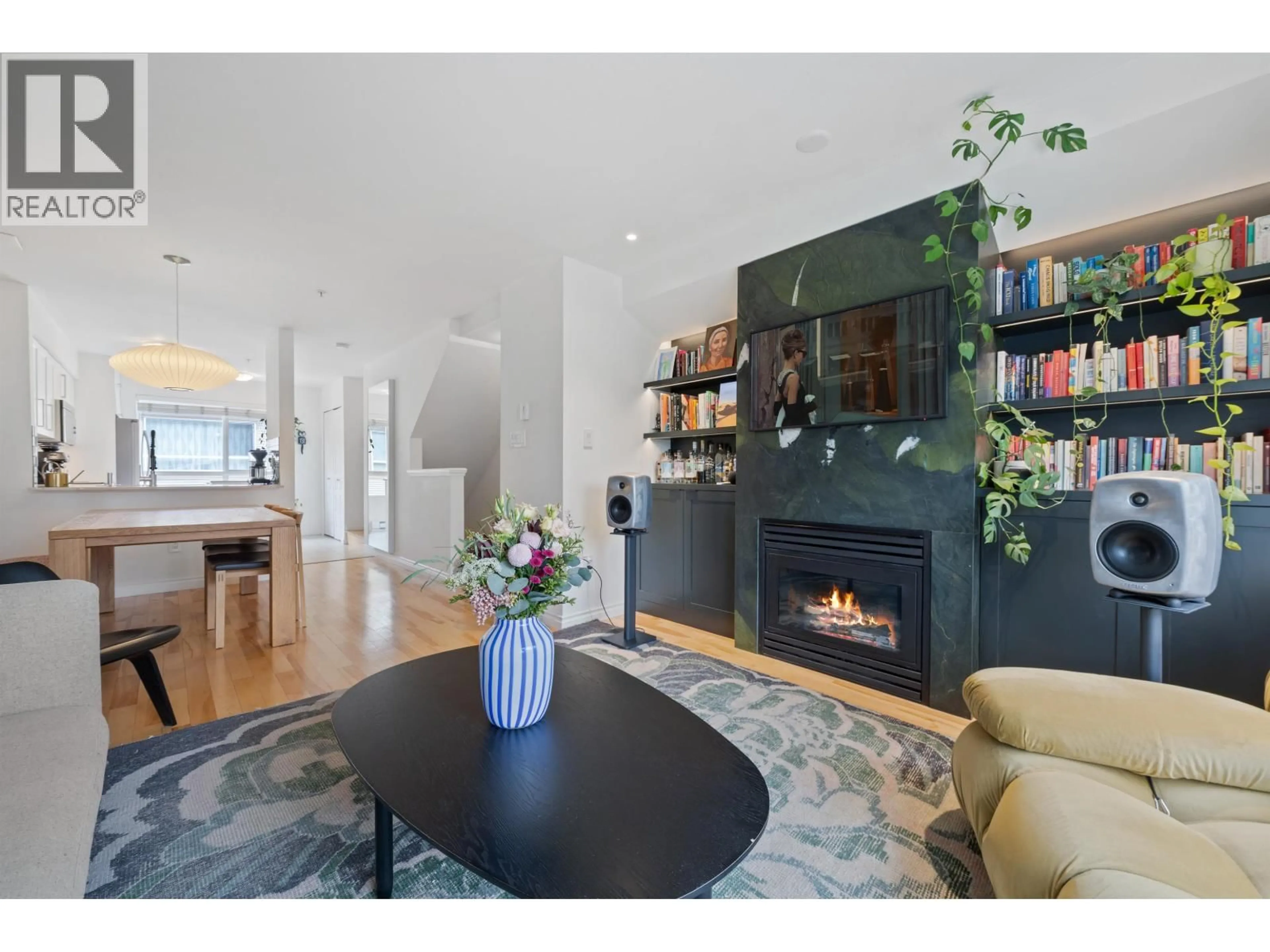 Living room with furniture, wood/laminate floor for 303 - 2688 WATSON STREET, Vancouver British Columbia V5T4T6