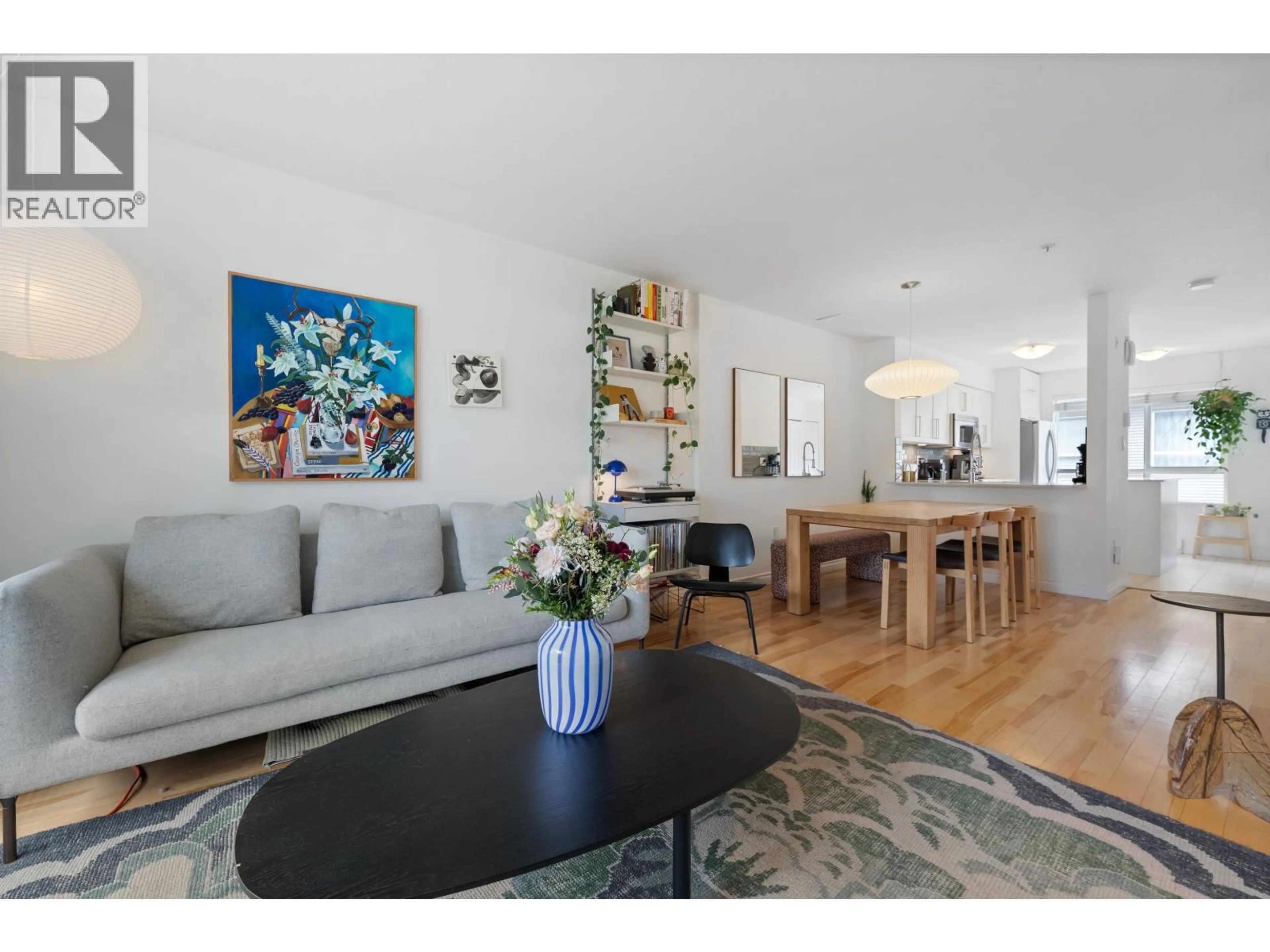 Living room with furniture, wood/laminate floor for 303 - 2688 WATSON STREET, Vancouver British Columbia V5T4T6