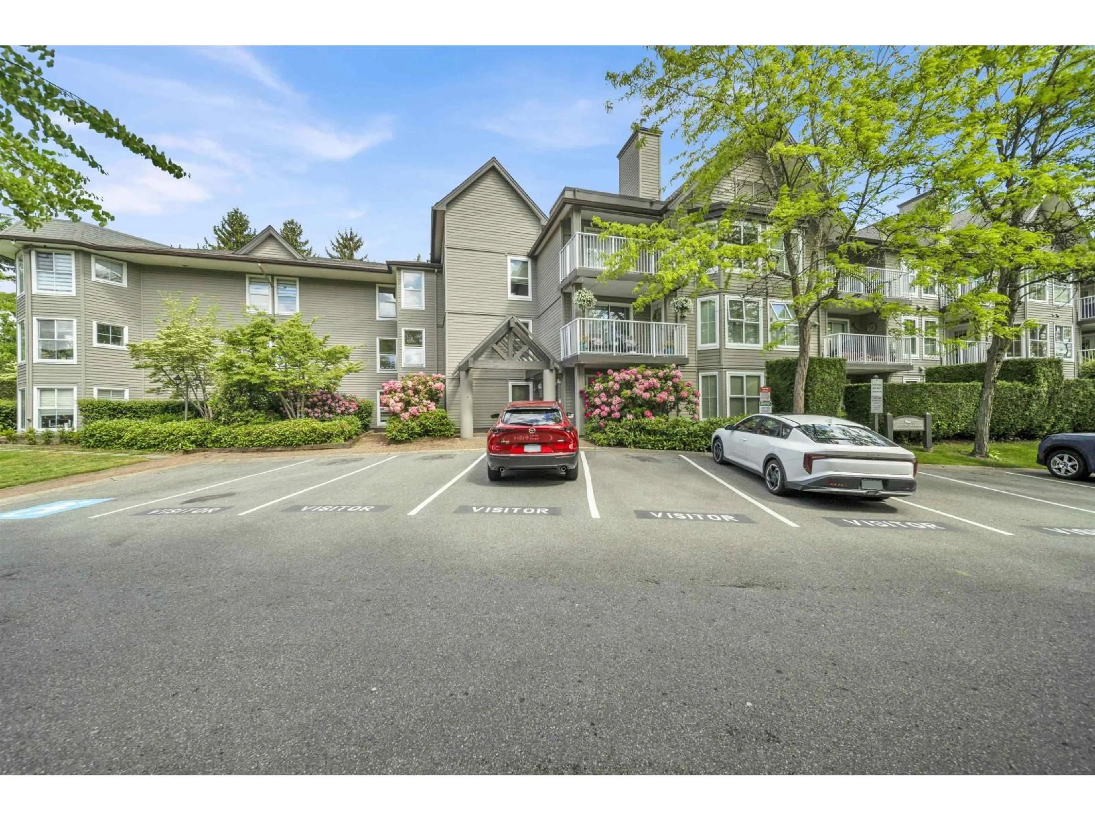 A pic from outside/outdoor area/front of a property/back of a property/a pic from drone, mountain view for 308 - 15160 108 AVENUE, Surrey British Columbia V3R0V2