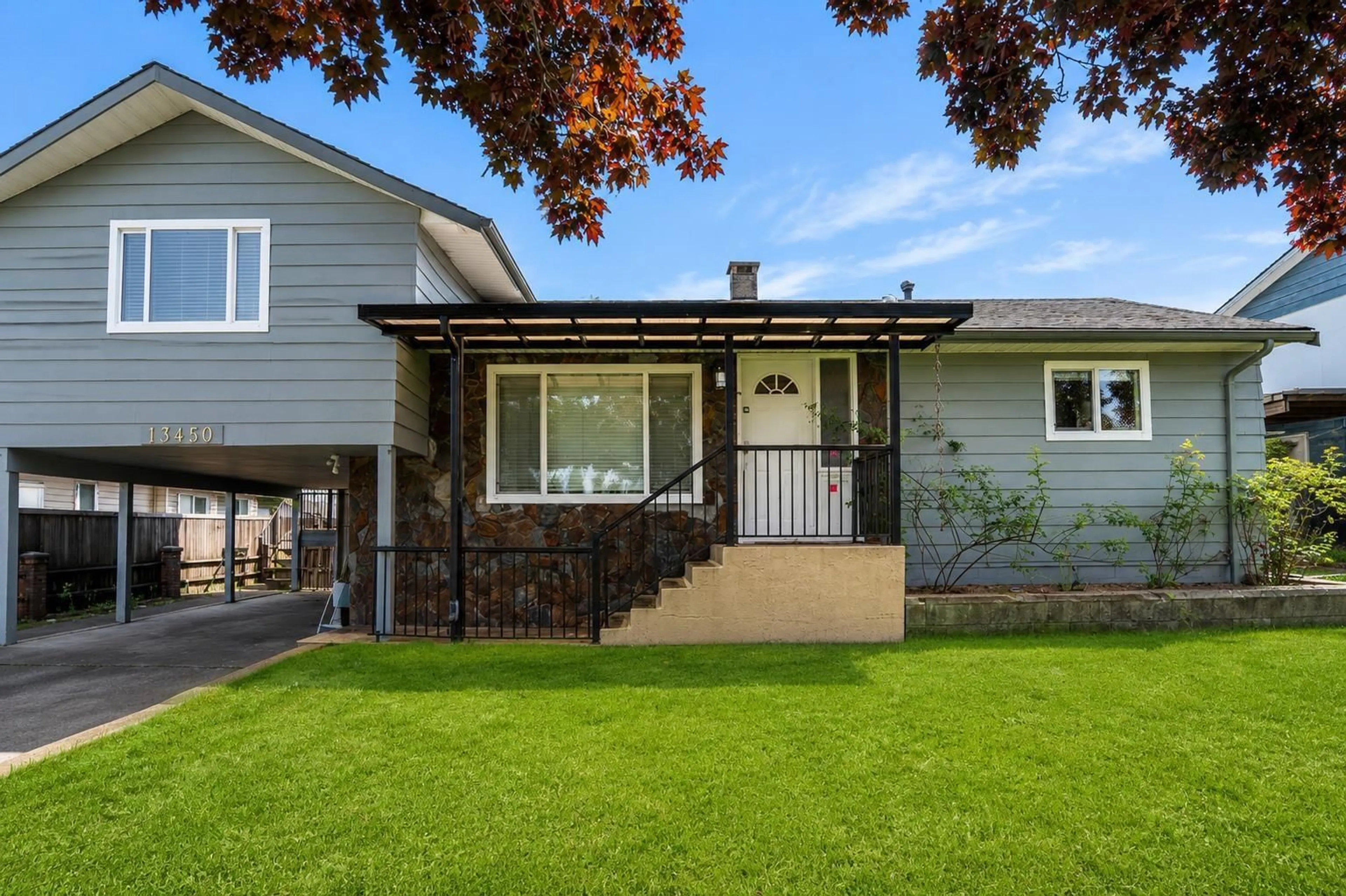 Home with vinyl exterior material, street for 13450 65A AVENUE, Surrey British Columbia V3W1Z6