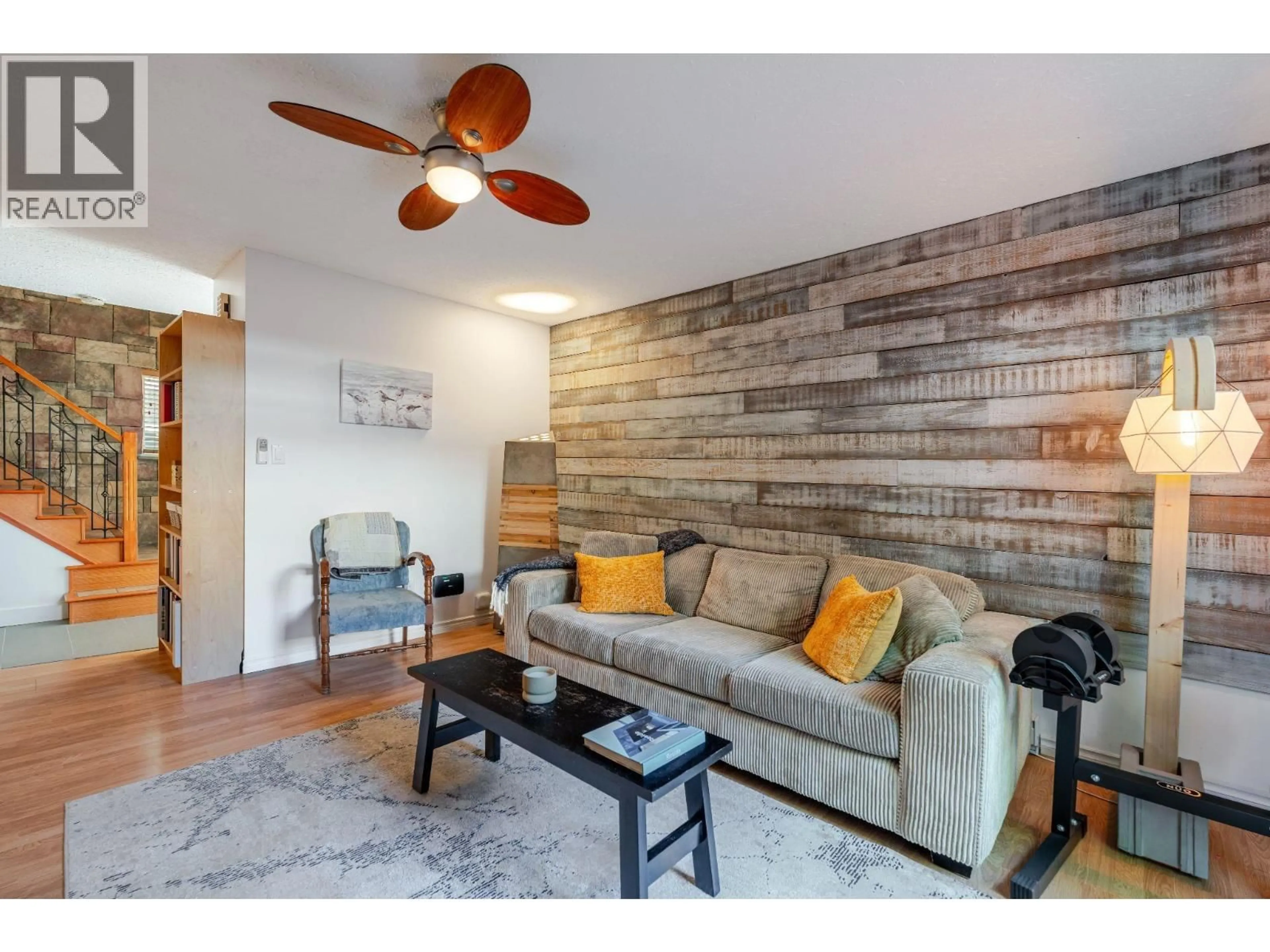 Living room with furniture, wood/laminate floor for 9 - 39752 GOVERNMENT ROAD, Squamish British Columbia V8B0G3