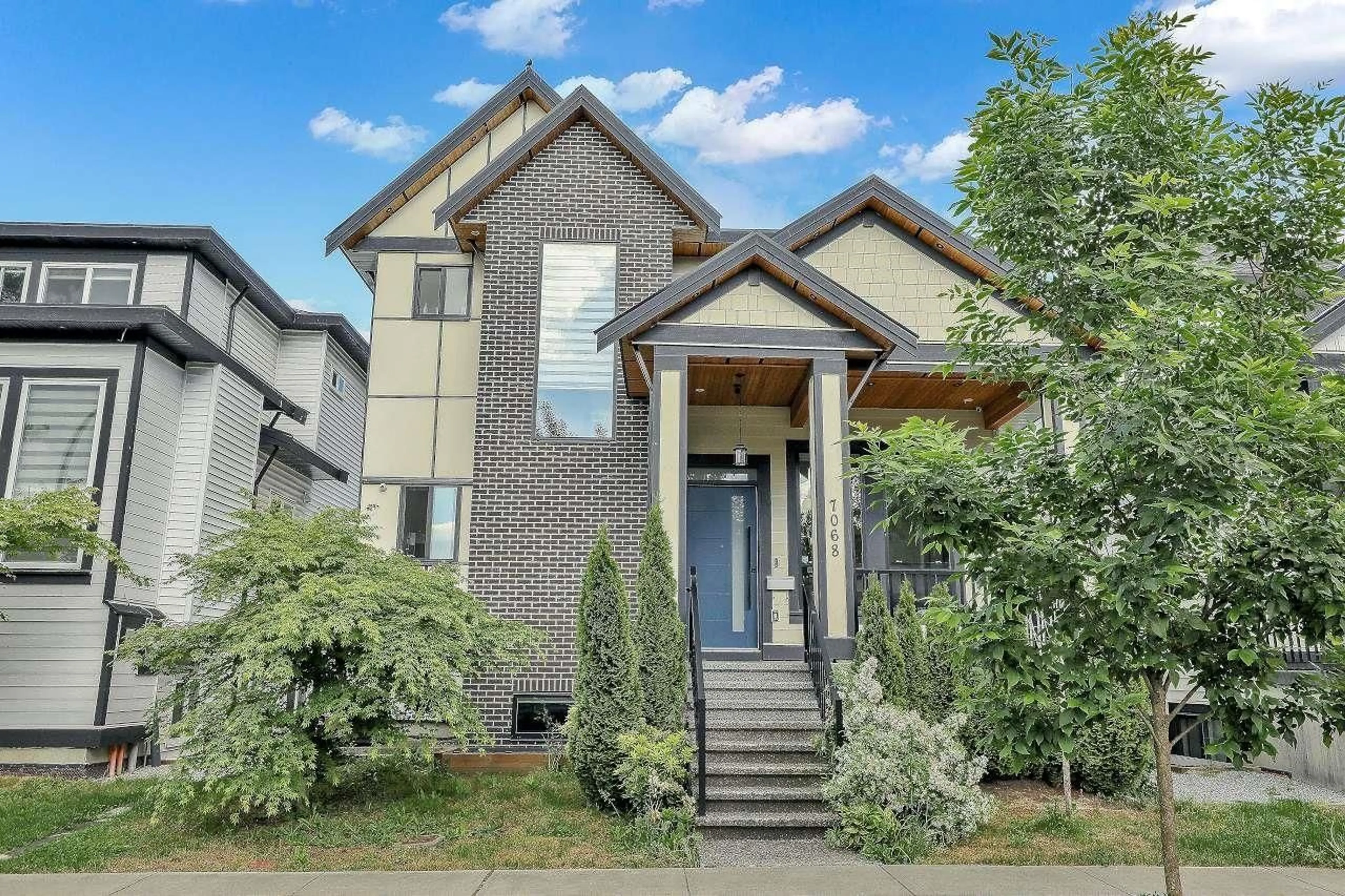 Home with brick exterior material, street for 7068 194 STREET, Surrey British Columbia V4N1N2