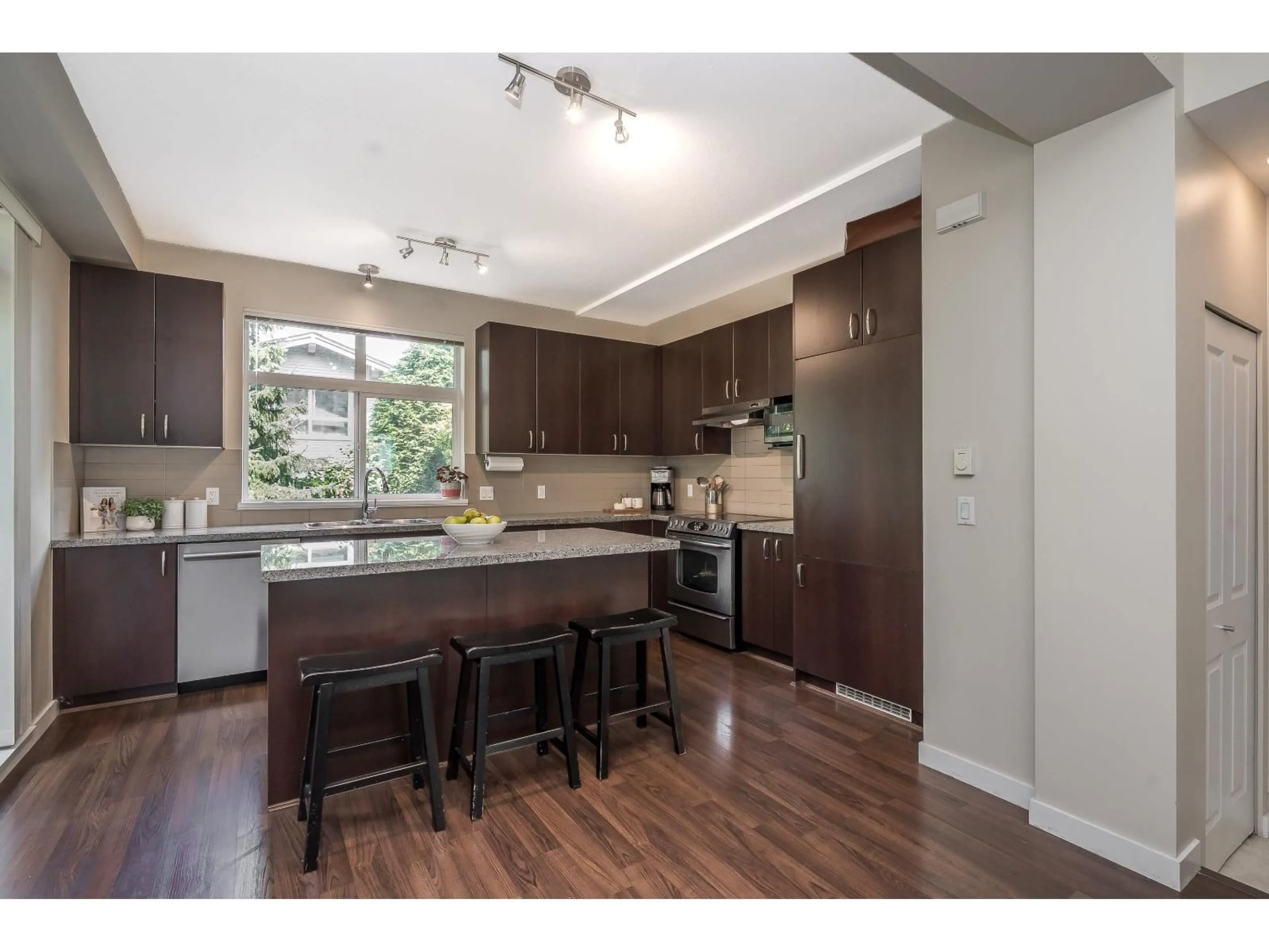 Open concept kitchen, wood/laminate floor for 123 - 2729 158 STREET, Surrey British Columbia V3Z1P4