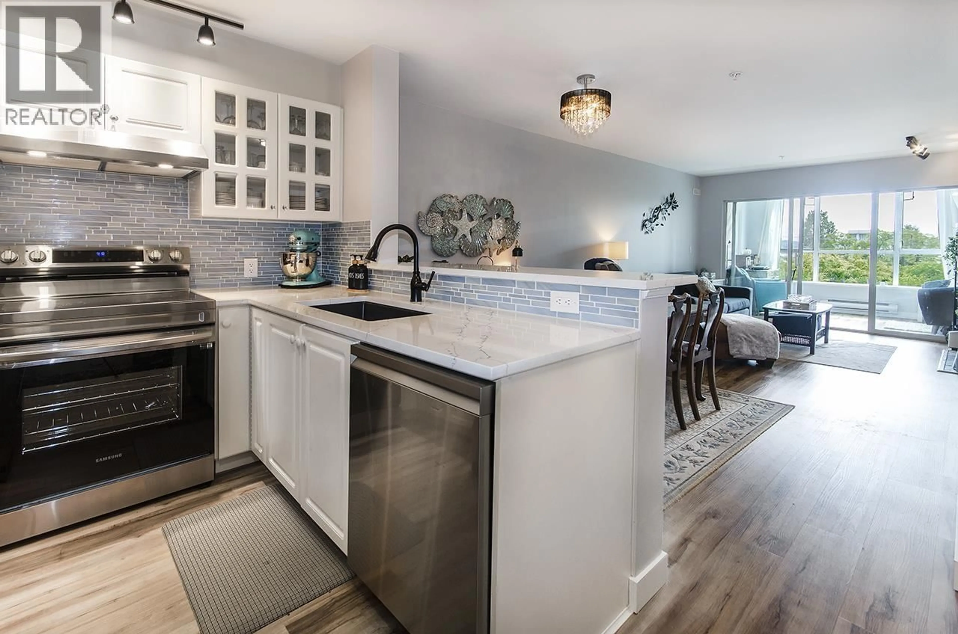 Open concept kitchen, unknown for 305 - 155 3RD STREET, North Vancouver British Columbia V7L1E5
