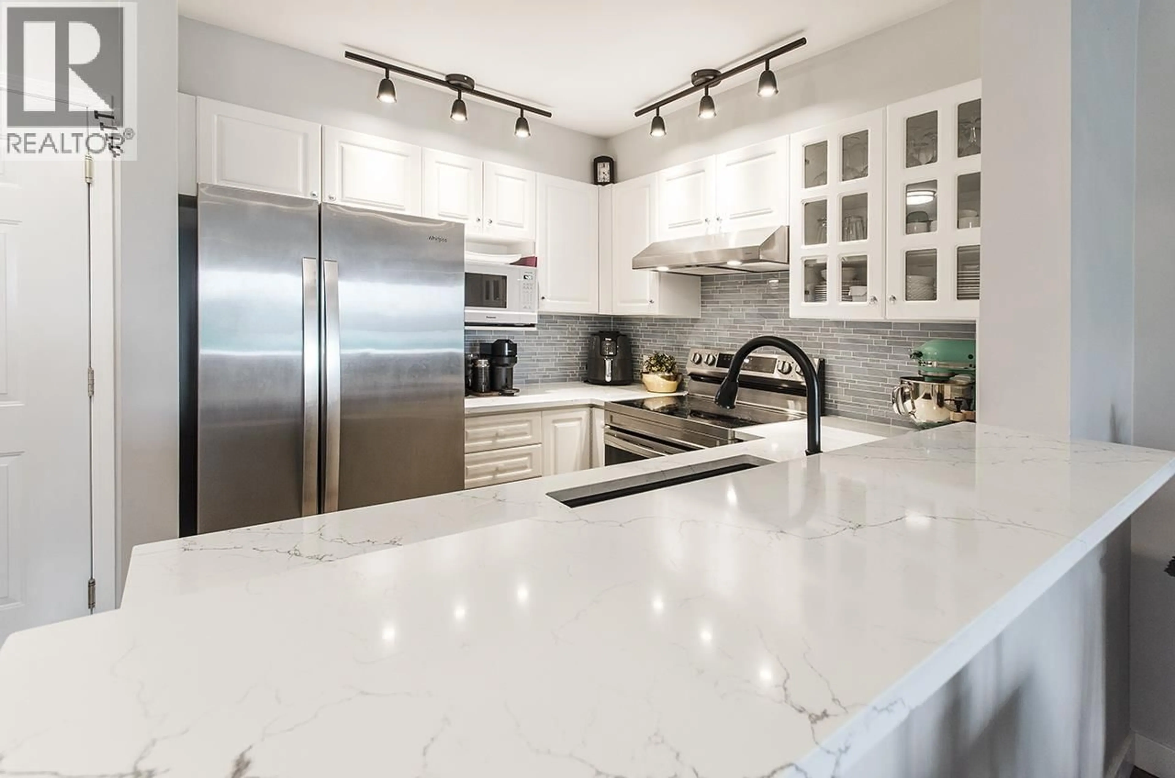 Contemporary kitchen, ceramic/tile floor for 305 - 155 3RD STREET, North Vancouver British Columbia V7L1E5