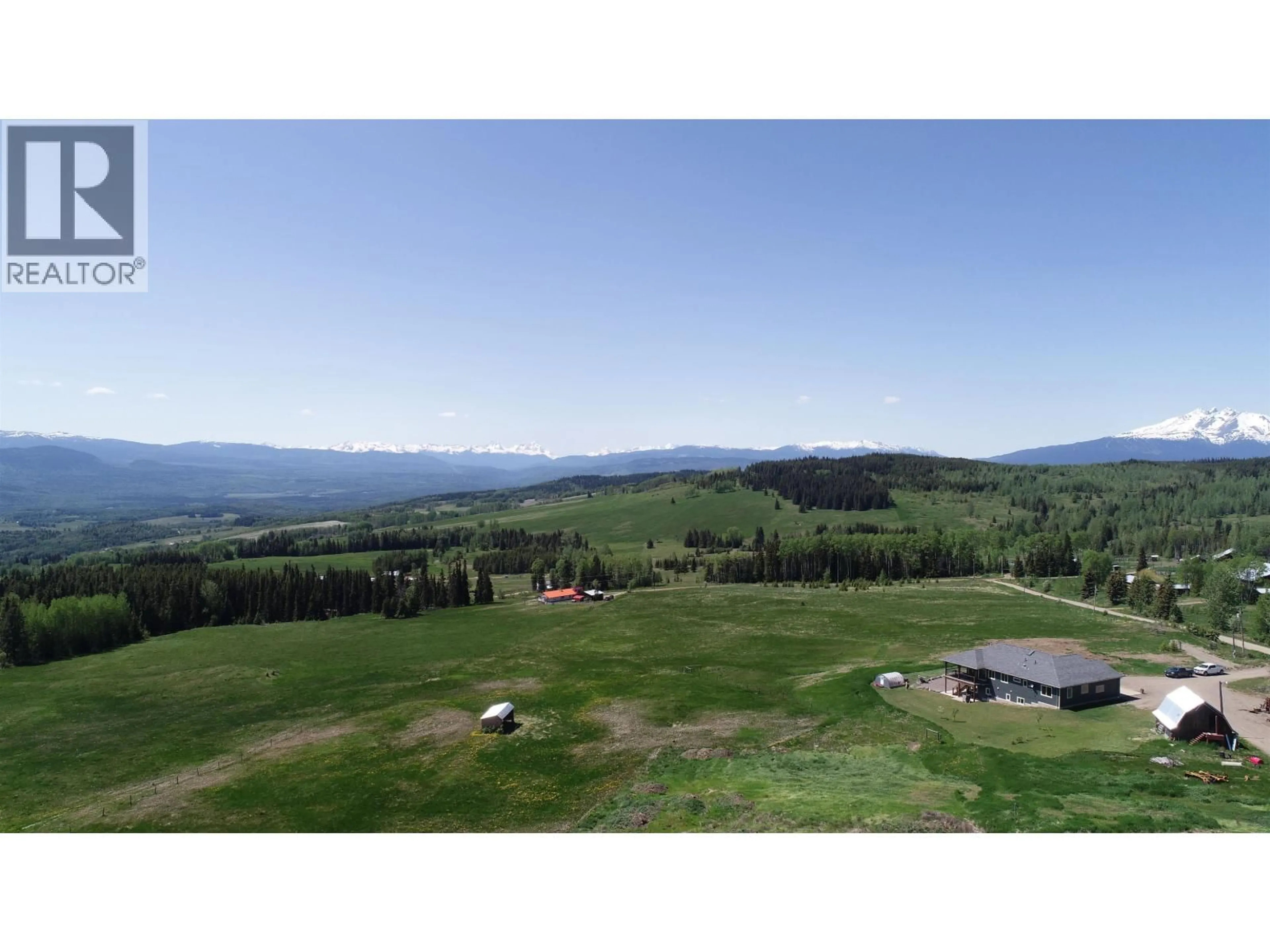 A pic from outside/outdoor area/front of a property/back of a property/a pic from drone, mountain view for 7018 BOUNDARY ROAD, Telkwa British Columbia V0J2X2