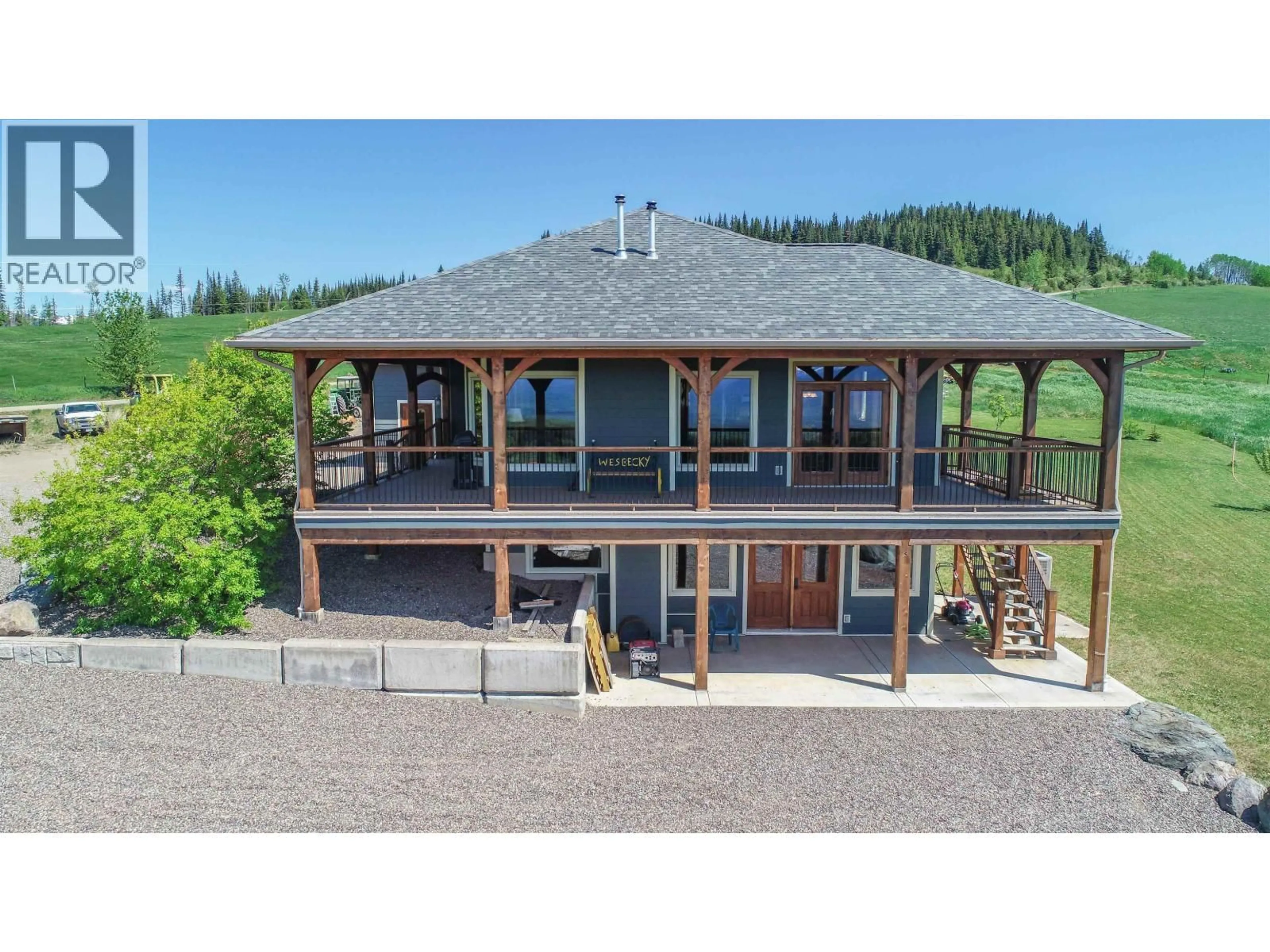 A pic from outside/outdoor area/front of a property/back of a property/a pic from drone, mountain view for 7018 BOUNDARY ROAD, Telkwa British Columbia V0J2X2