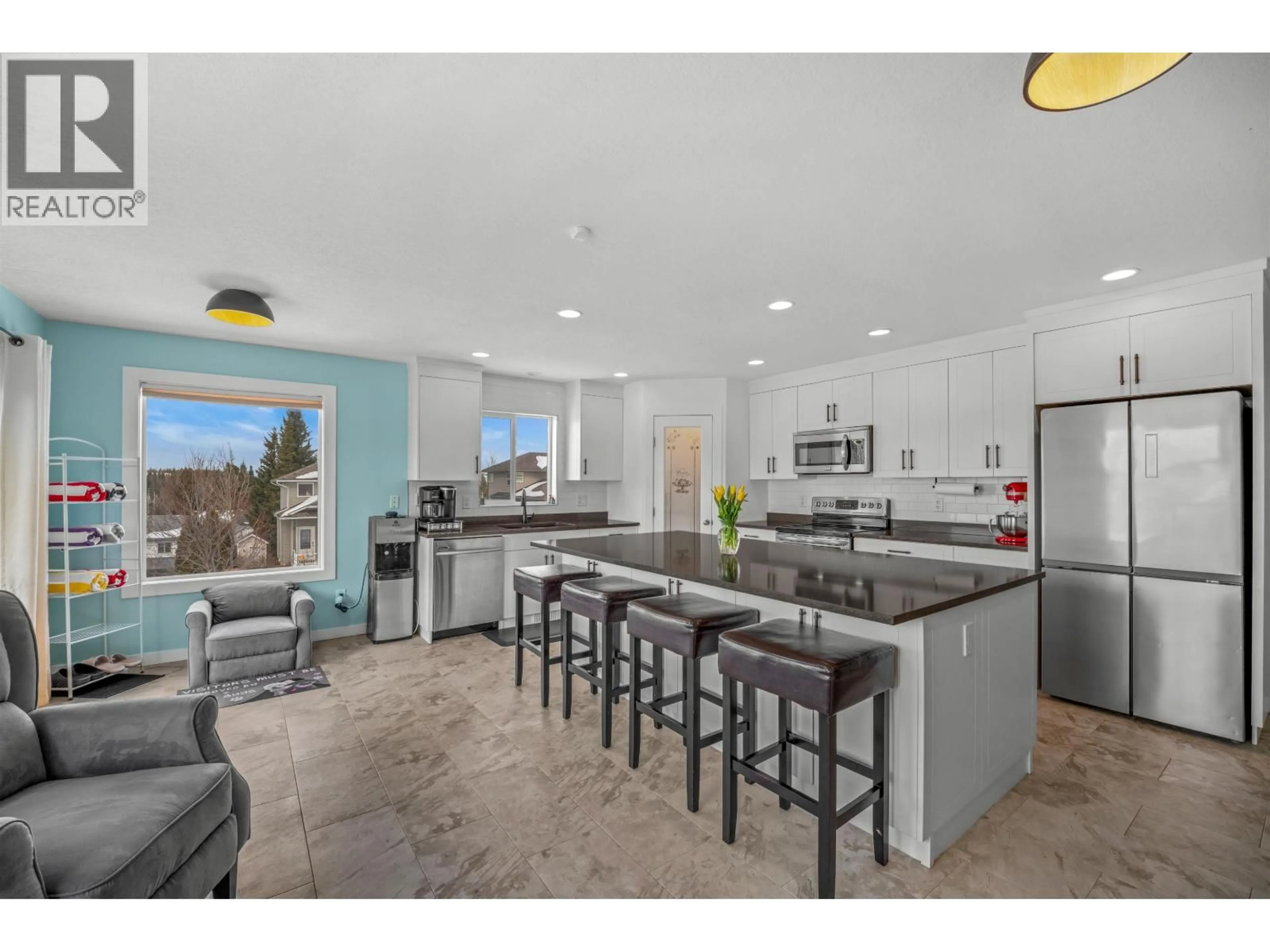 Open concept kitchen, ceramic/tile floor for 7003 TRYGG COURT, Prince George British Columbia V2N6Z8