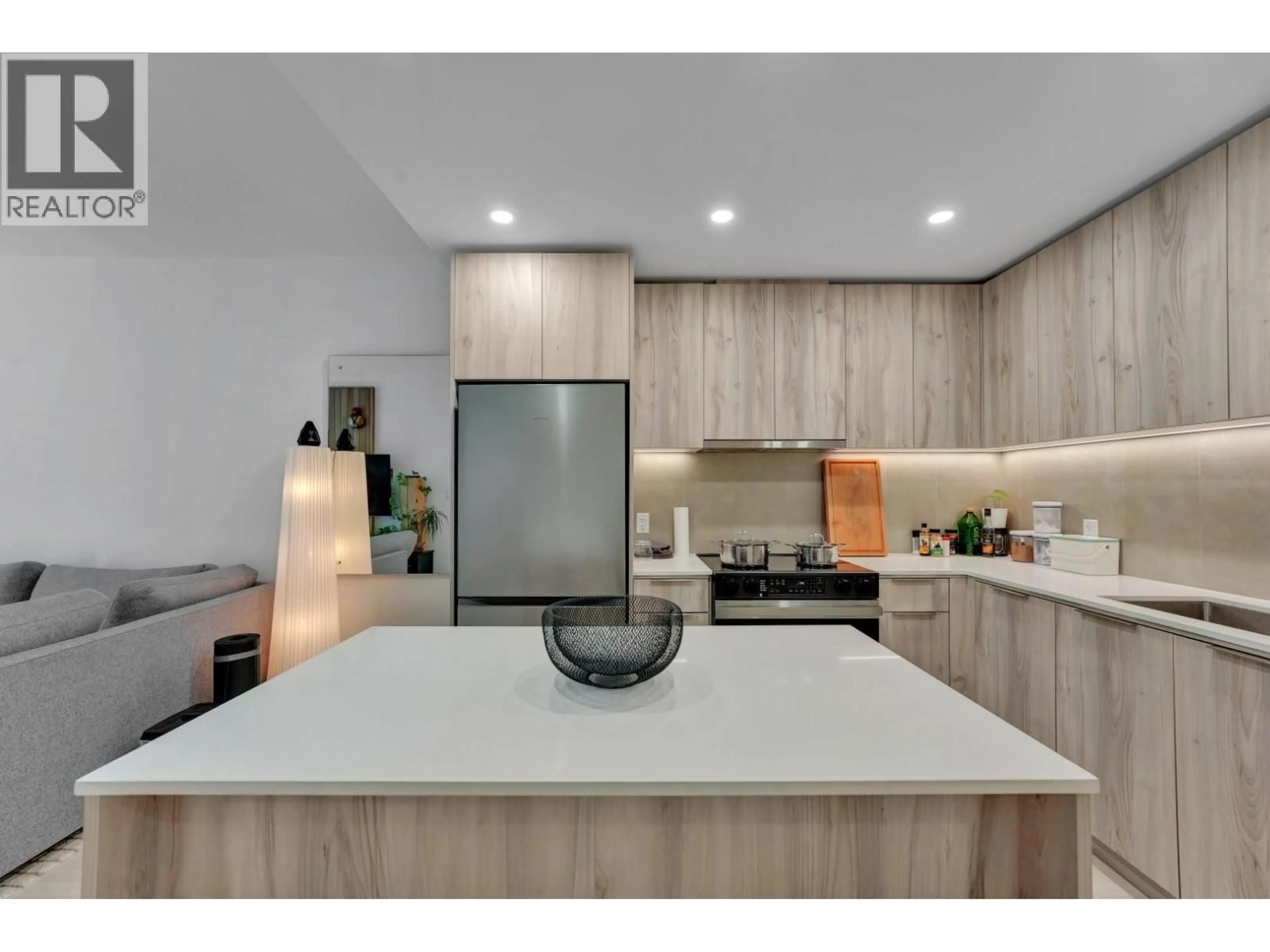 Open concept kitchen, unknown for 211 - 3596 MALSUM DRIVE, North Vancouver British Columbia V7G0B5