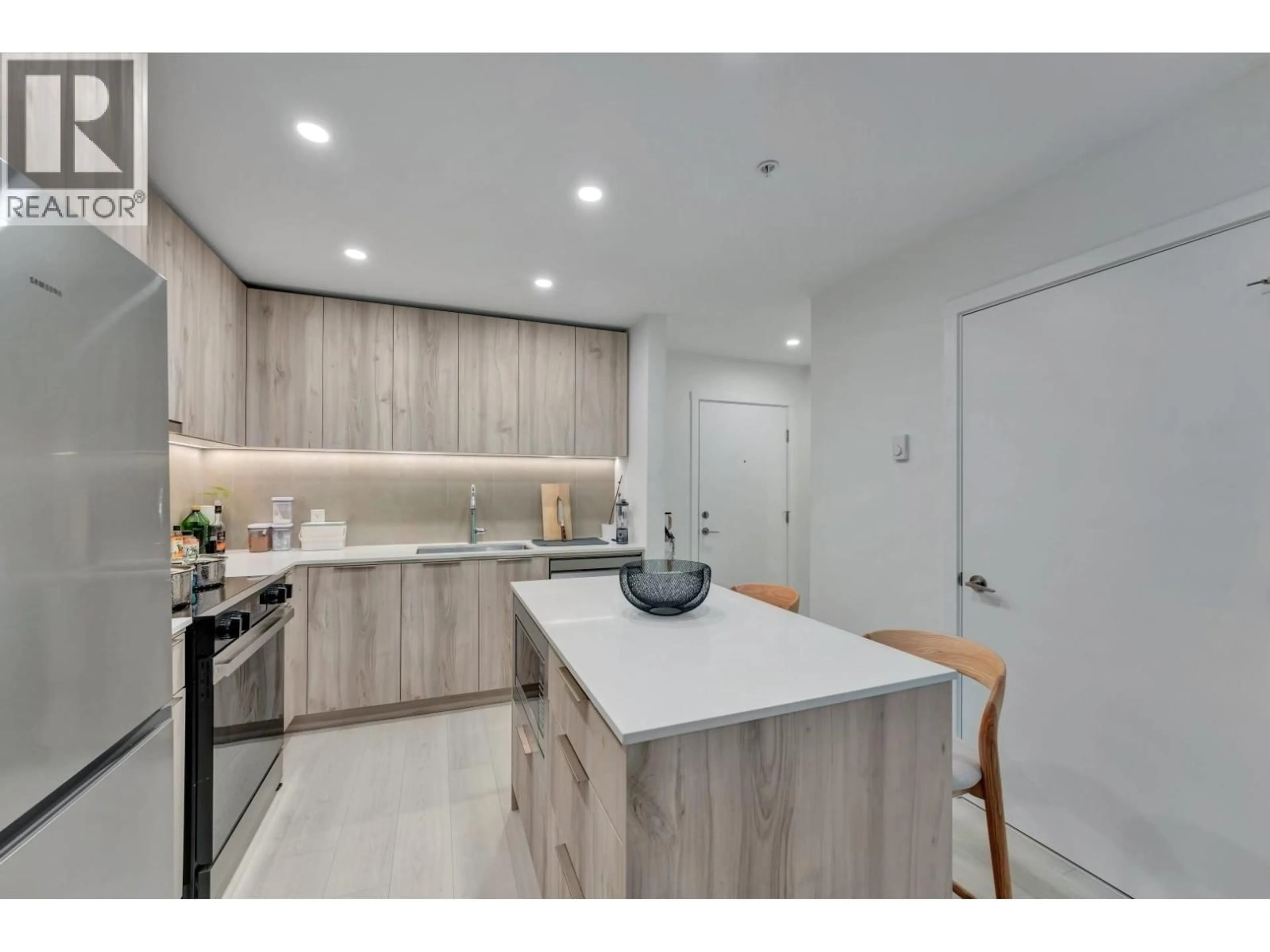 Open concept kitchen, unknown for 211 - 3596 MALSUM DRIVE, North Vancouver British Columbia V7G0B5