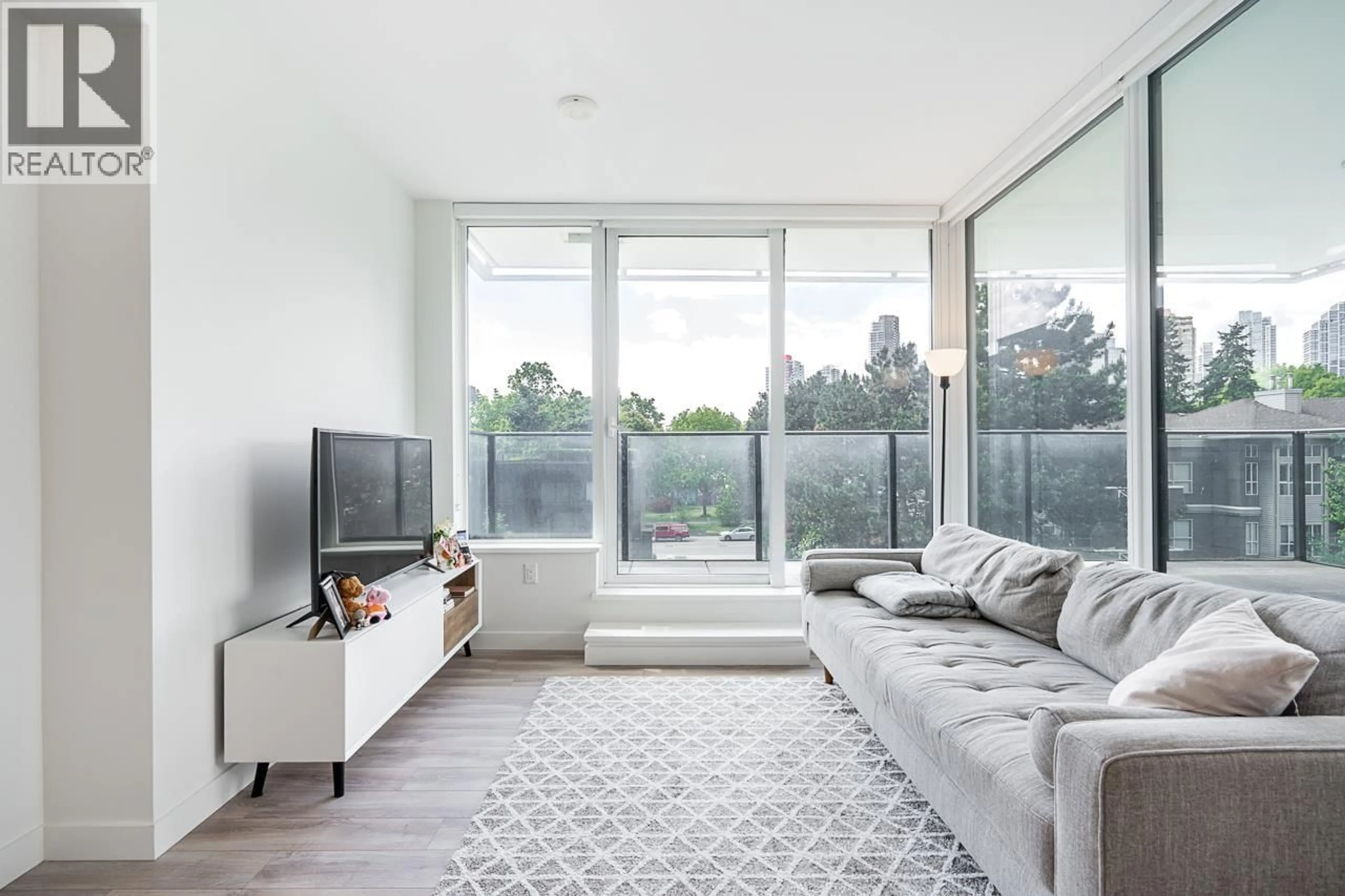 Living room with furniture, unknown for 301 - 6699 DUNBLANE AVENUE, Burnaby British Columbia V5H0J8