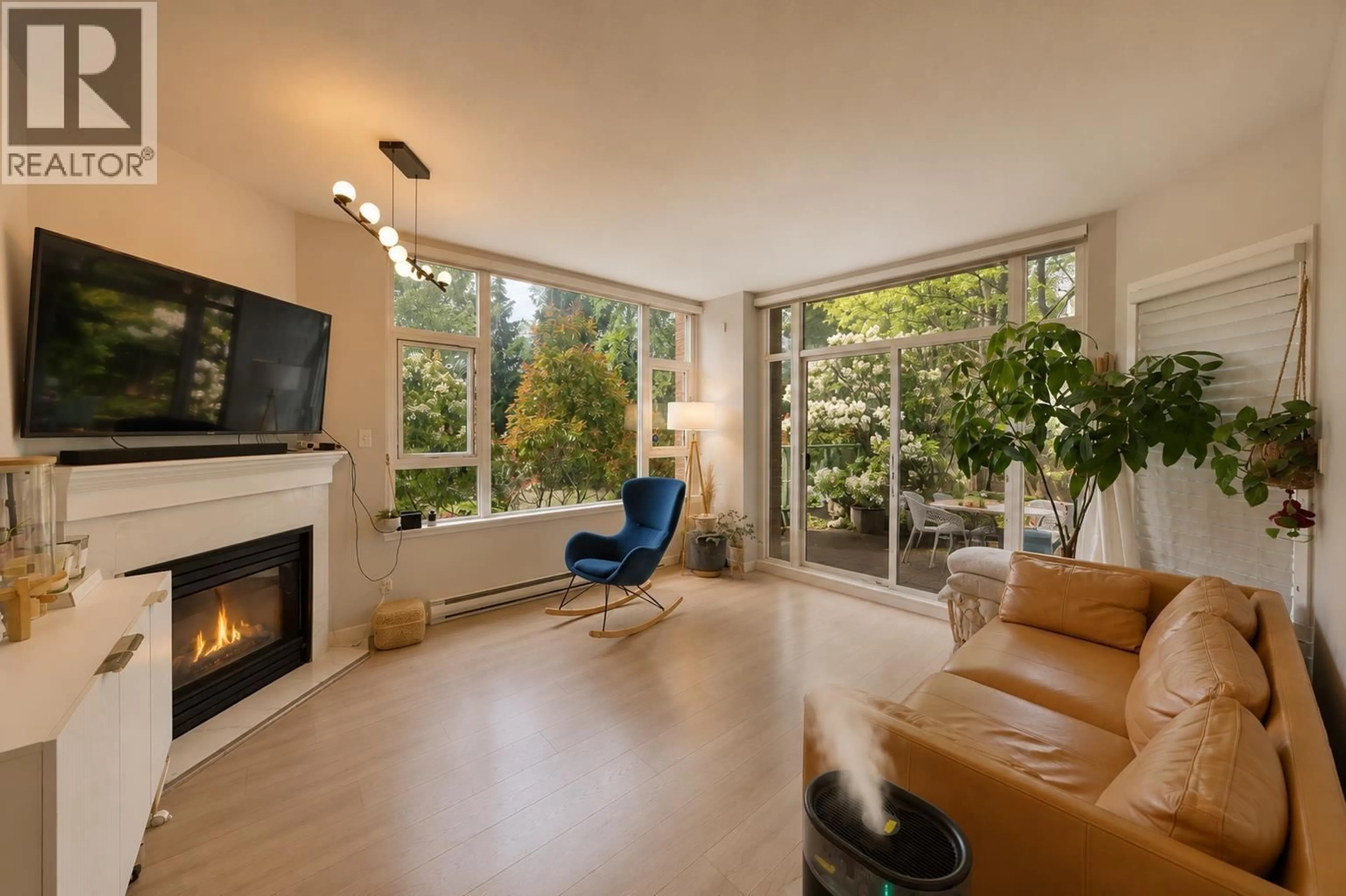 Living room with furniture, unknown for 101 - 7108 EDMONDS STREET, Burnaby British Columbia V3N4X9