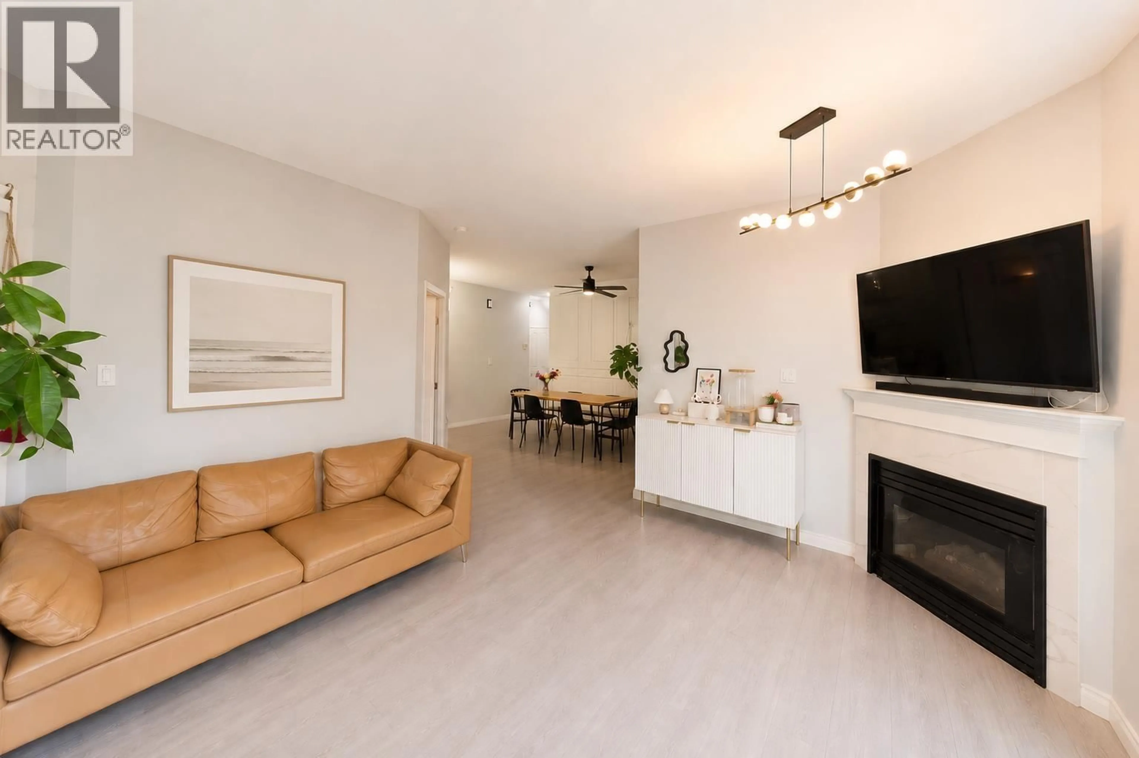 Living room with furniture, unknown for 101 - 7108 EDMONDS STREET, Burnaby British Columbia V3N4X9
