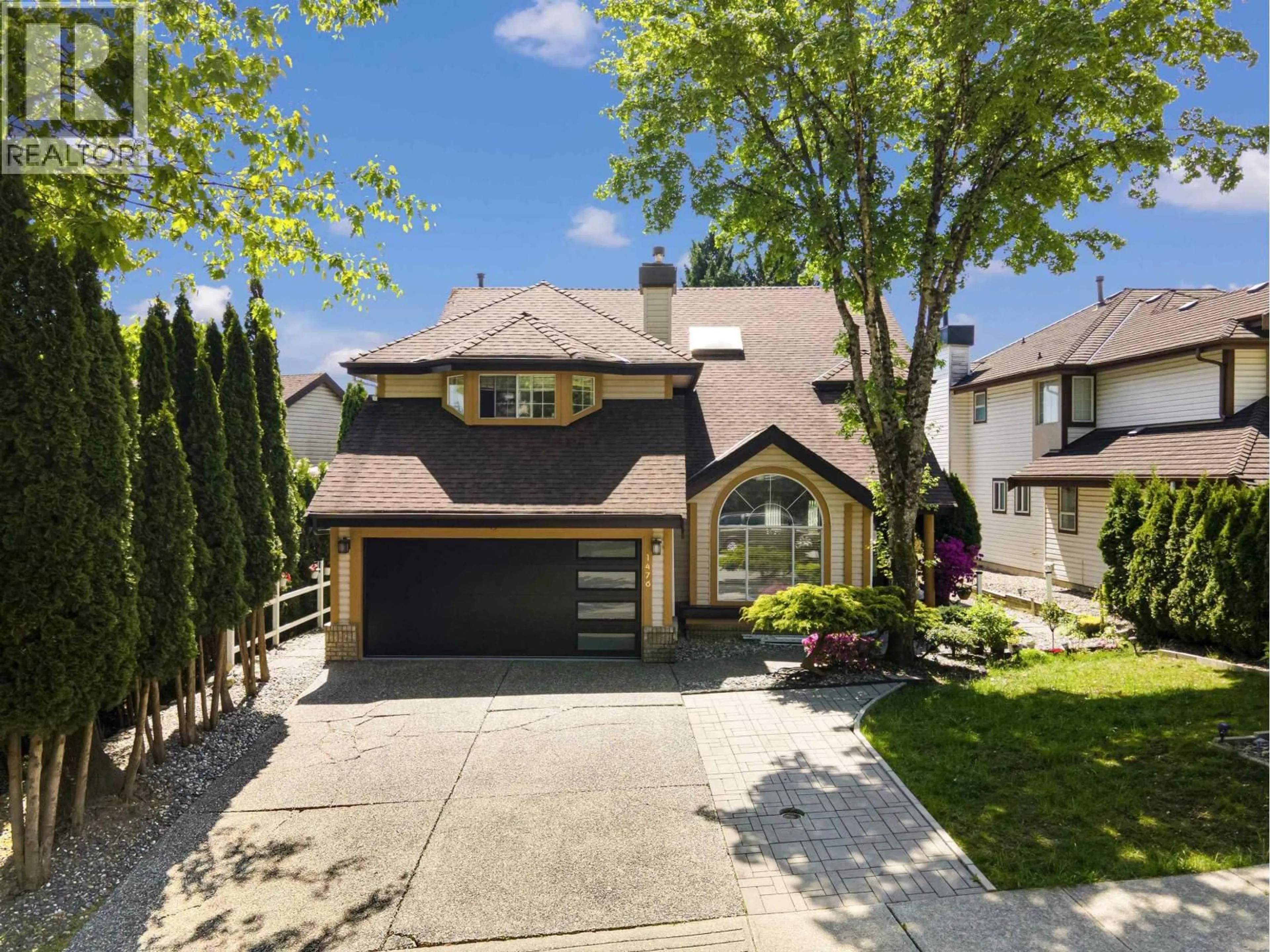 Home with vinyl exterior material, street for 1476 LANSDOWNE DRIVE DRIVE, Coquitlam British Columbia V3E2S8
