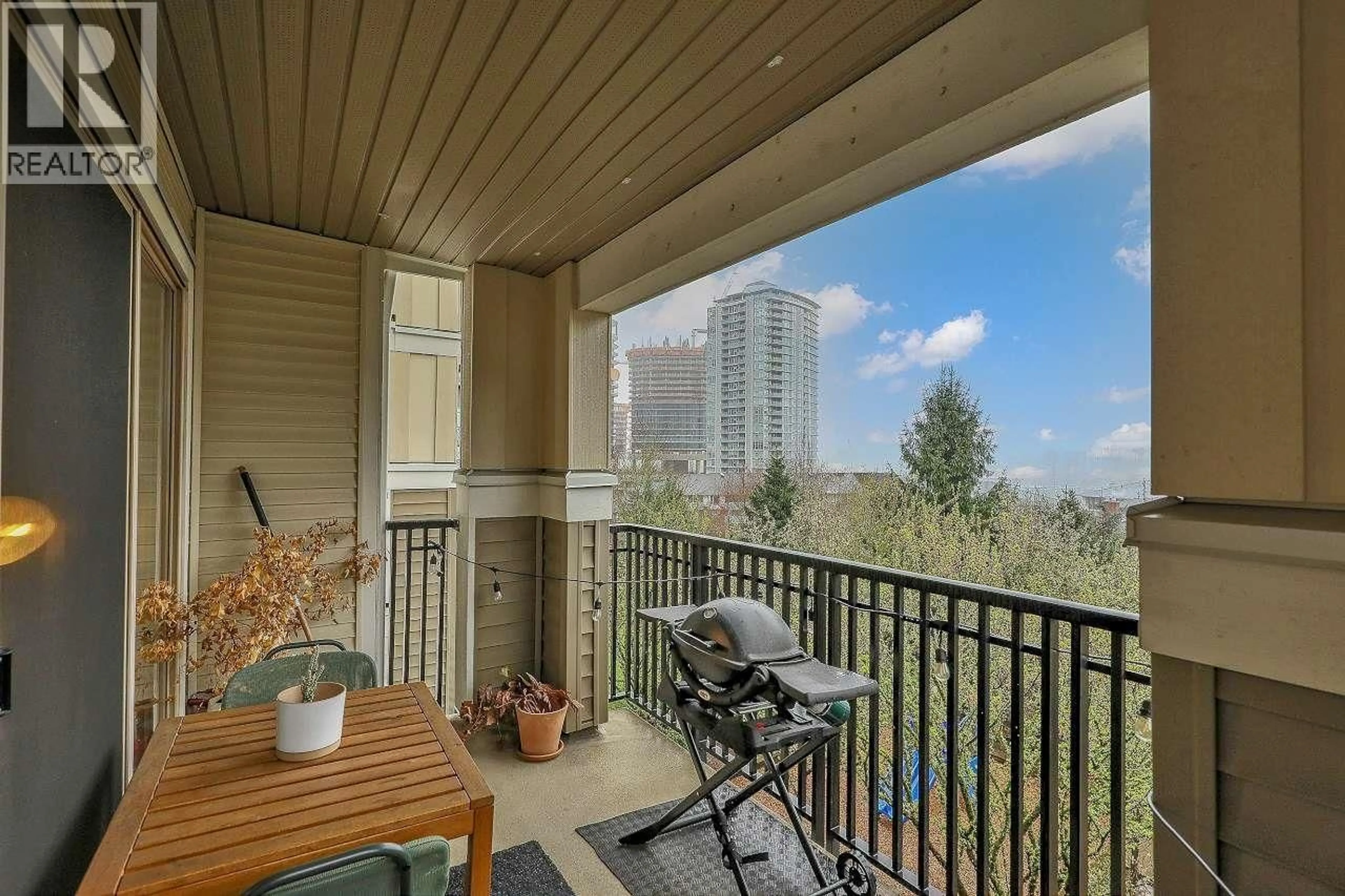 Balcony in the apartment, city buildings view from balcony for 311 - 2088 BETA AVENUE, Burnaby British Columbia V5C0C8