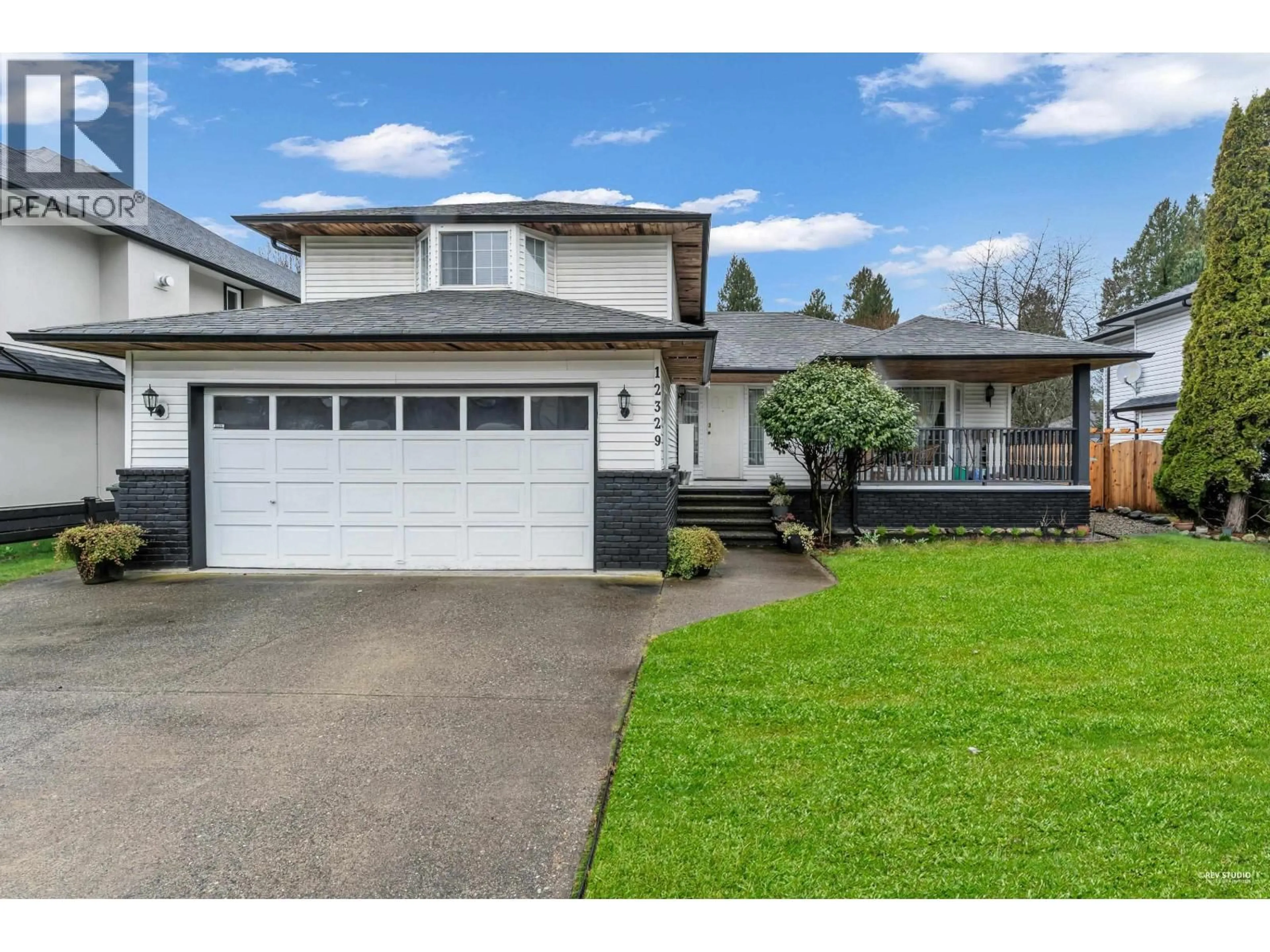 Home with vinyl exterior material, street for 12329 BONSON ROAD, Pitt Meadows British Columbia V3Y1B1