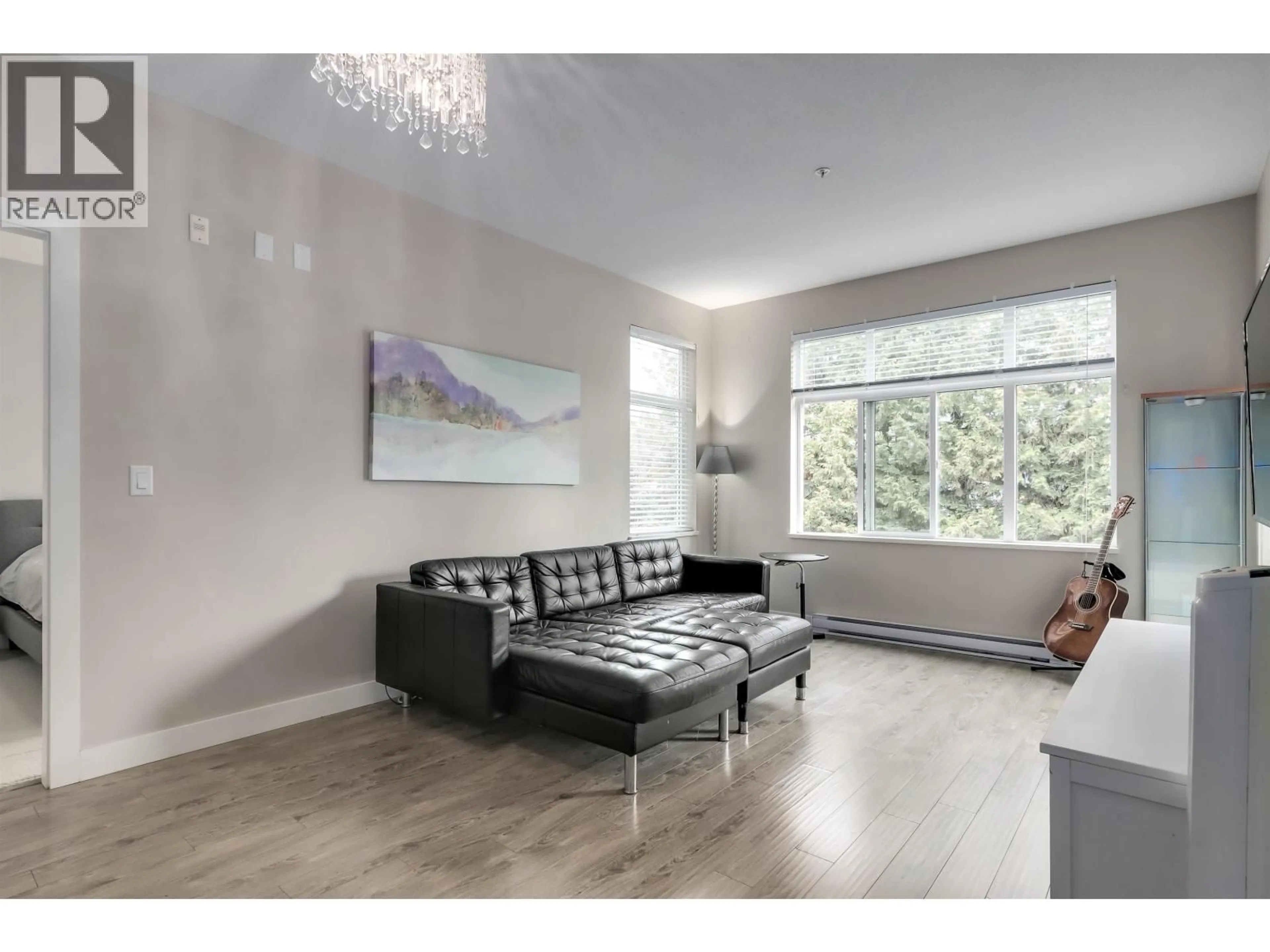 Living room with furniture, wood/laminate floor for 2308 - 963 CHARLAND AVENUE, Coquitlam British Columbia V3K0E2